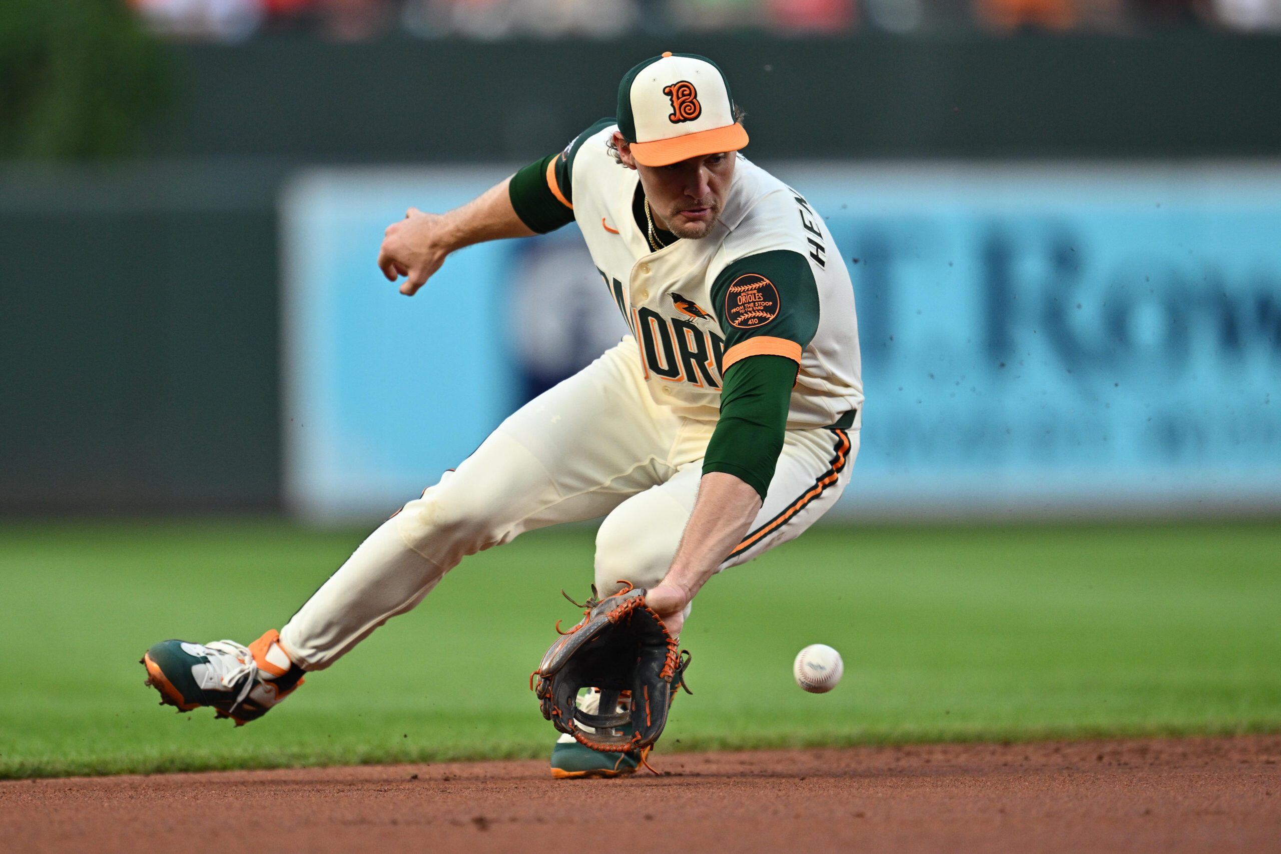 Jul 10, 2026; Baltimore, Maryland, USA;  Baltimore Orioles infielder Gunnar Henderson (2) chases down a ground ball to start a double play in the second inning against the Kansas City Royals at Oriole Park at Camden Yards. Mandatory Credit: Jamie Sabau-Imagn Images