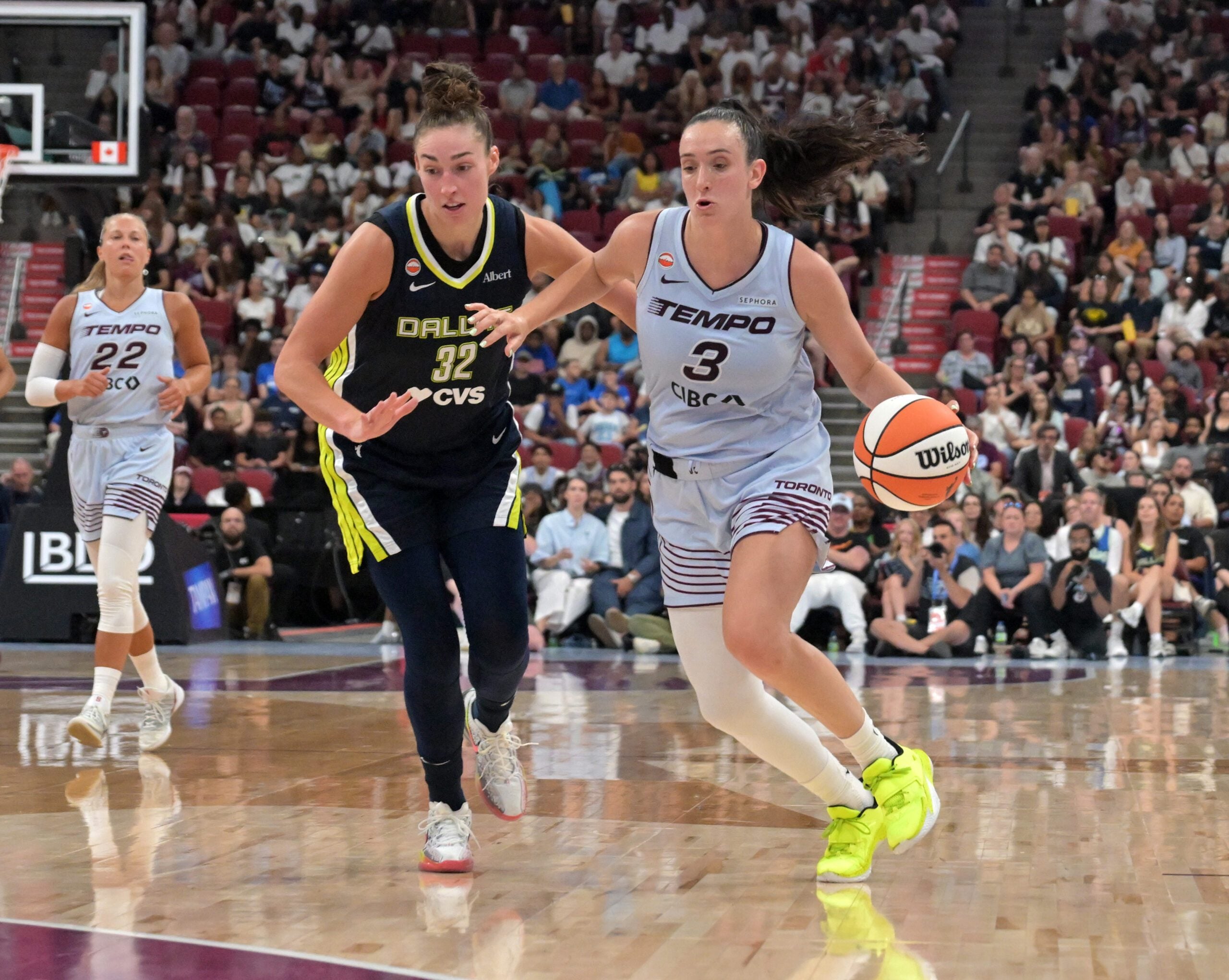 Jul 10, 2026; Montreal, Quebec, CAN; Dallas Wings forward Jessica Shepard (32) and Toronto Tempo guard Marina Mabrey (3) in the second half at the Bell Centre. Mandatory Credit: Eric Bolte-Imagn Images