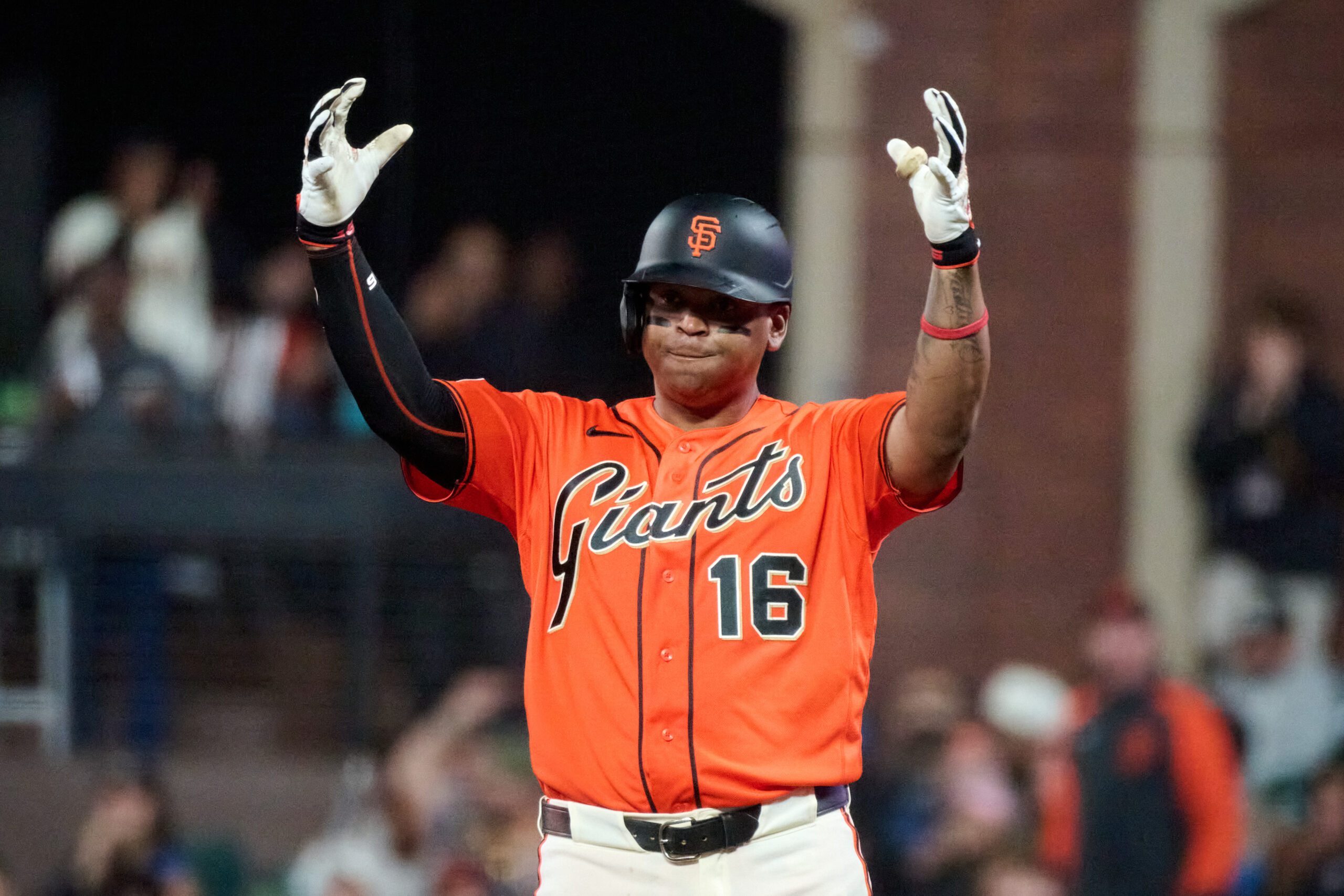 Jul 10, 2026; San Francisco, California, USA; San Francisco Giants infielder Rafael Devers (16) acknowledges the dugout after hitting a one run RBI single against the Colorado Rockies during the seventh inning at Oracle Park. Mandatory Credit: Robert Edwards-Imagn Images