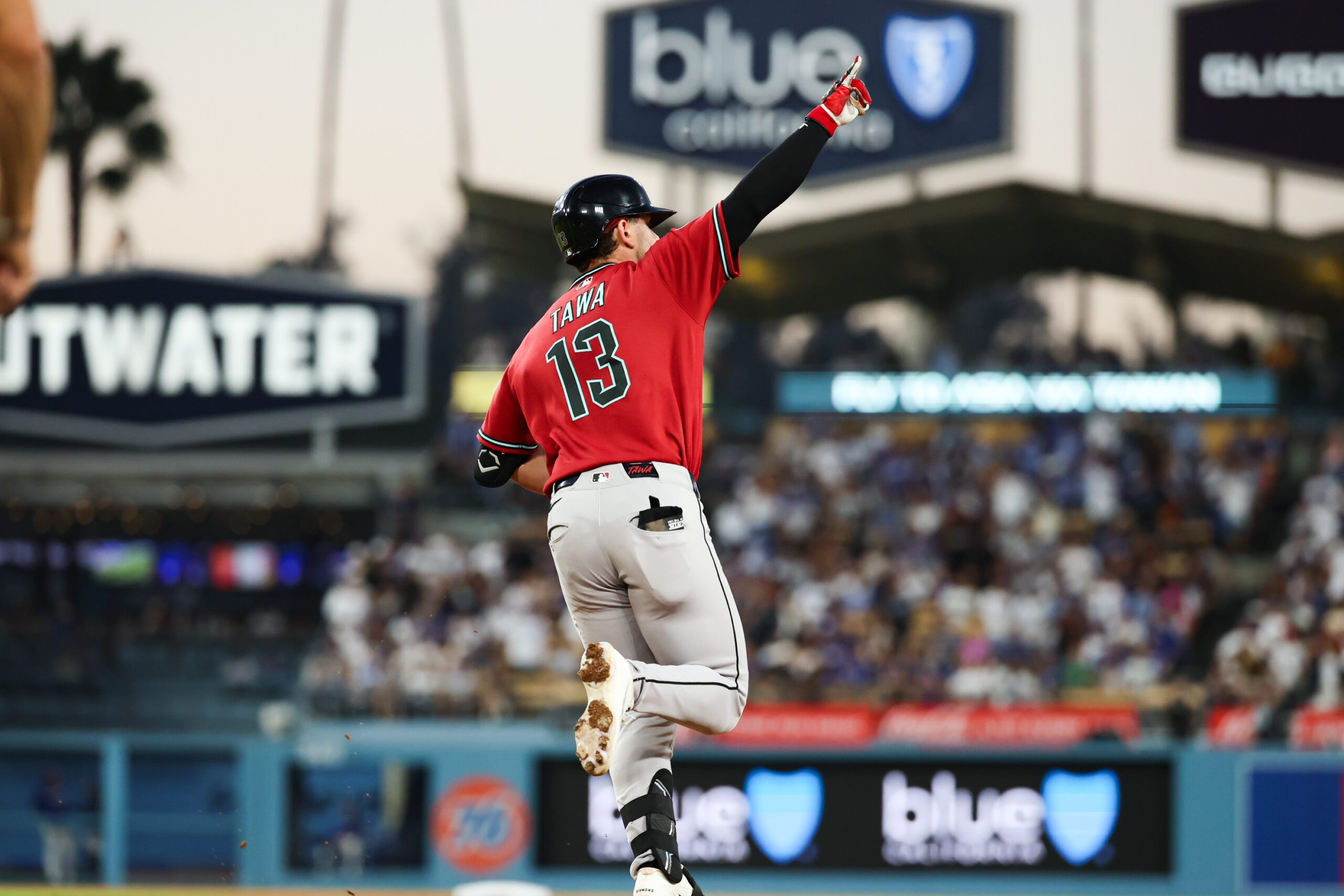 Jul 2, 2026; Los Angeles, California, USA;  Arizona Diamondbacks left fielder Tim Tawa (13) round the bases after a home run at the top of the fourth inning against the Los Angeles Dodgers at Dodger Stadium. Mandatory Credit: William Navarro-Imagn Images