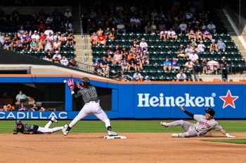 Jul 11, 2026; New York City, New York, USA;  New York Mets shortstop Francisco Lindor (12) catches a toss by second baseman Zack Short (40) forcing out Boston Red Sox shortstop Tsung-Che Cheng (39) during the fifth inning at Citi Field. Mandatory Credit: Vincent Carchietta-Imagn Images