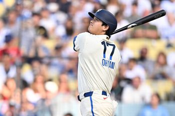 Jul 11, 2026; Los Angeles, California, USA; Los Angeles Dodgers designated hitter Shohei Ohtani (17) flies out during the first inning against the Arizona Diamondbacks at Dodger Stadium. Mandatory Credit: William Liang-Imagn Images