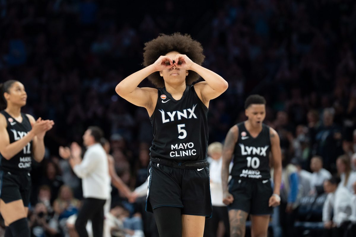 Jul 13, 2026; Minneapolis, Minnesota, USA; Minnesota Lynx guard Olivia Miles (5) celebrates making a go ahead three point shot against the Phoenix Mercury in the second half at Target Center. Mandatory Credit: Jesse Johnson-Imagn Images