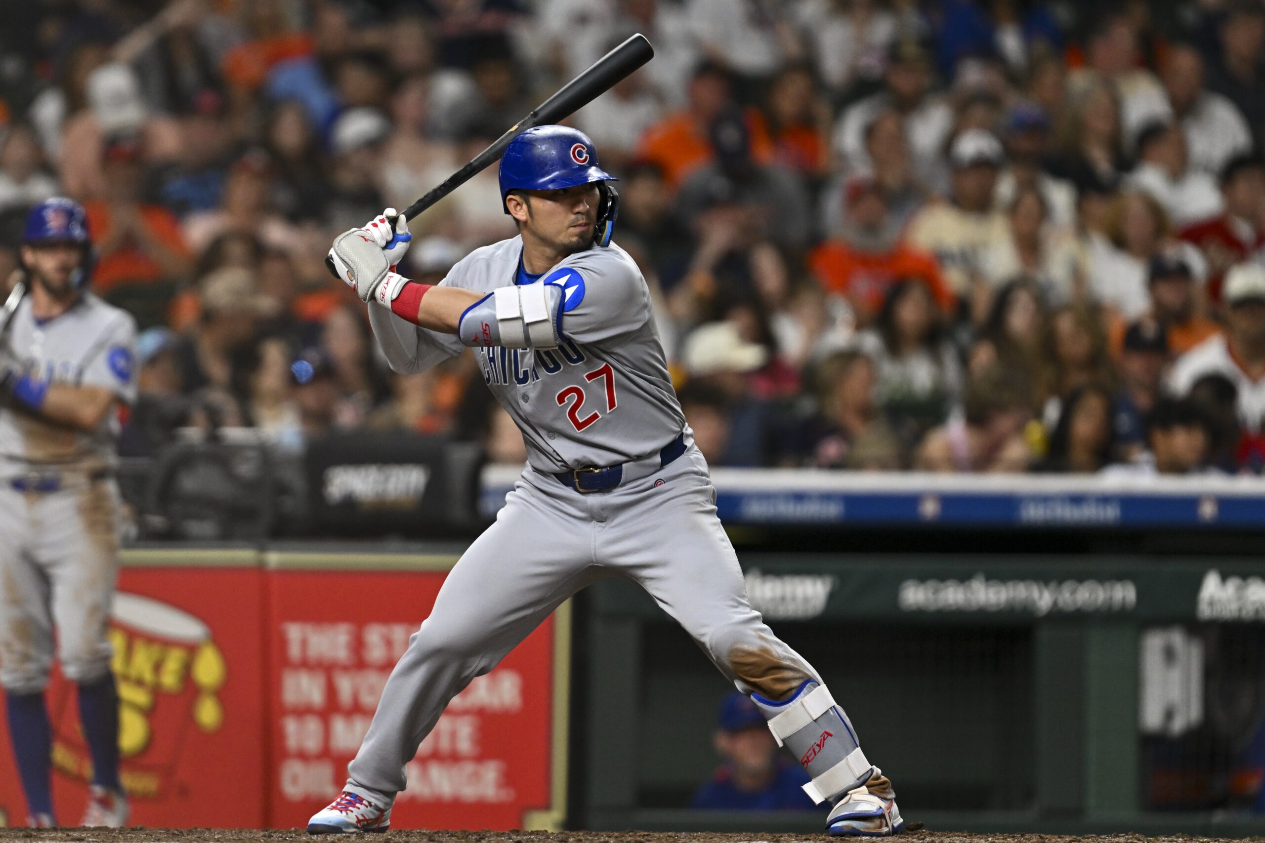 Jun 27, 2025; Houston, Texas, USA; Chicago Cubs designated hitter Seiya Suzuki (27) bats in the sixth inning against the Houston Astros at Daikin Park. Mandatory Credit: Maria Lysaker-Imagn Images