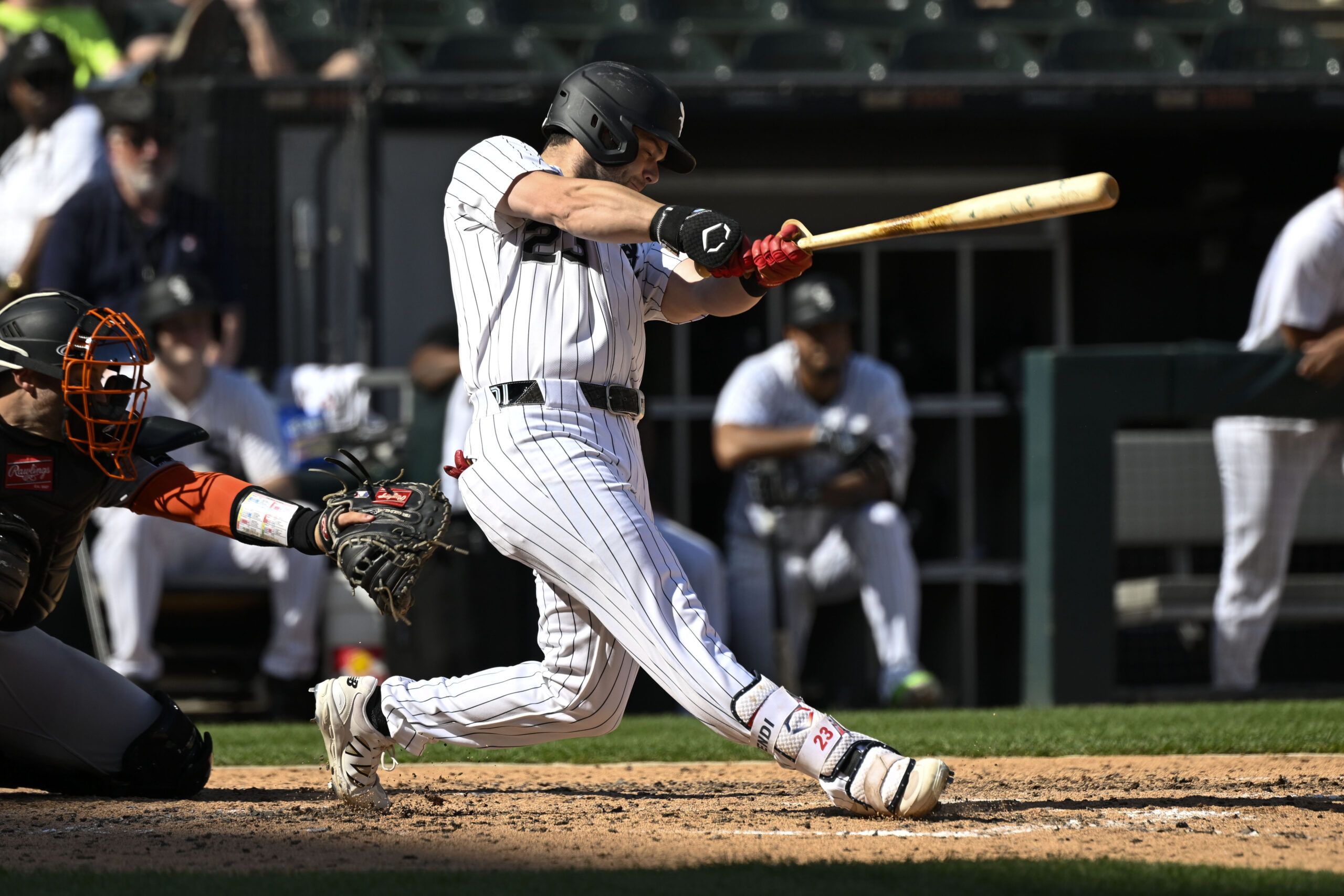 Jun 28, 2025; Chicago, Illinois, USA; Chicago White Sox outfielder Andrew Benintendi (23) hits a home run against the San Francisco Giants during the seventh inning at Rate Field. Mandatory Credit: Matt Marton-Imagn Images