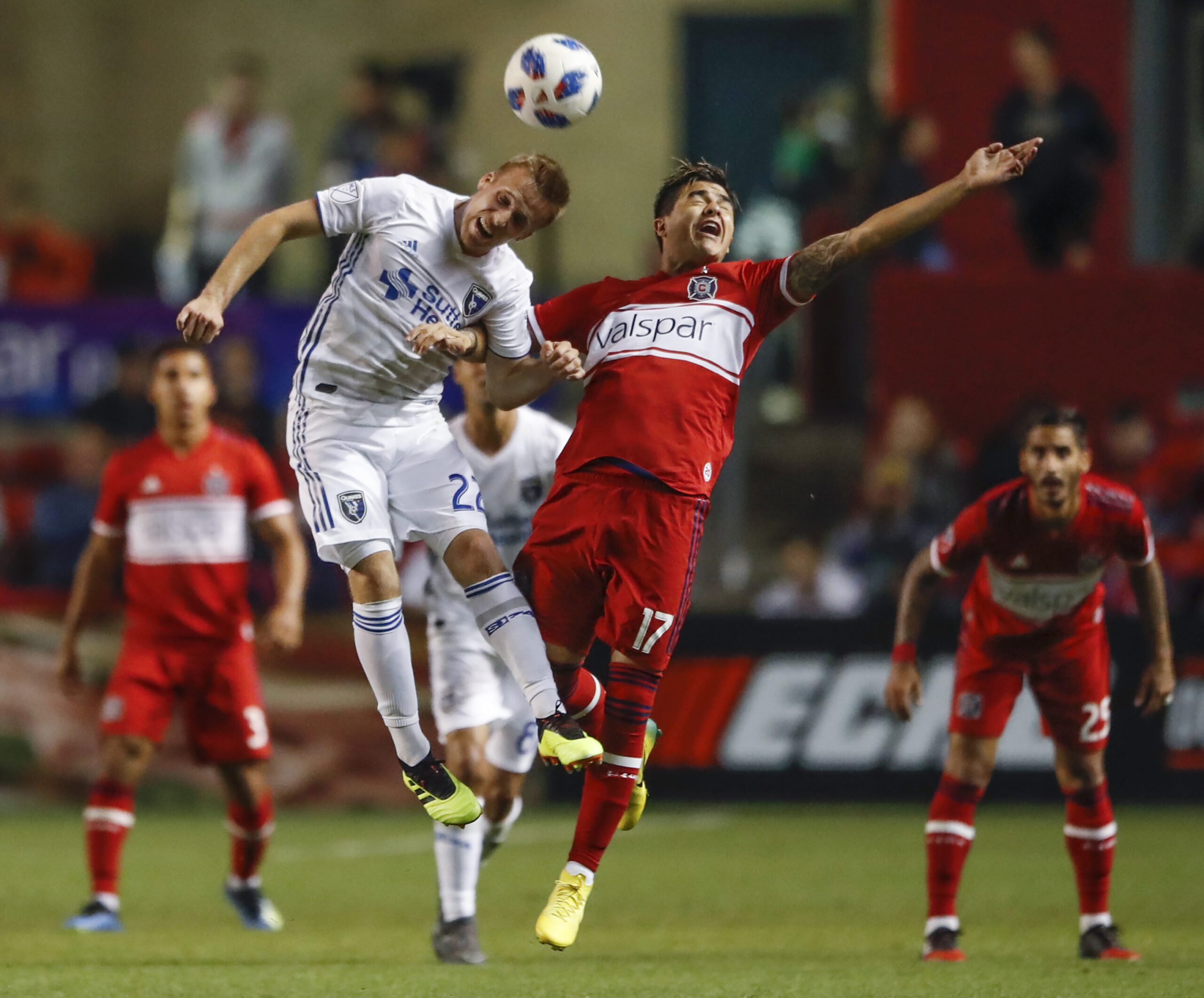 Jun 2, 2018; Chicago, IL, USA; San Jose Earthquakes forward Tommy Thompson (22) goes for a header against Chicago Fire forward Diego Campos (17) during the second half at Bridgeview Stadium. Mandatory Credit: Kamil Krzaczynski-Imagn Images