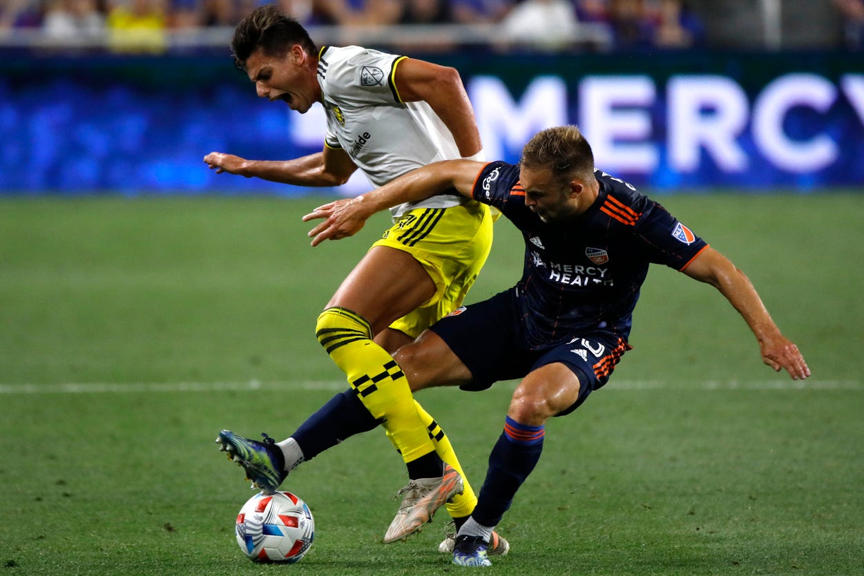 FC Cincinnati defender Avionne Flanagan (27) and Columbus Crew forward Erik Hurtado (33) fight for possession of the ball during the second half of a MLS game between FC Cincinnati and Columbus Crew on Friday, July 9, 2021 at TQL Stadium in Cincinnati where the teams tied 2-2.
Fc Cincinnati Vs Columbus Crew 07 09 21
