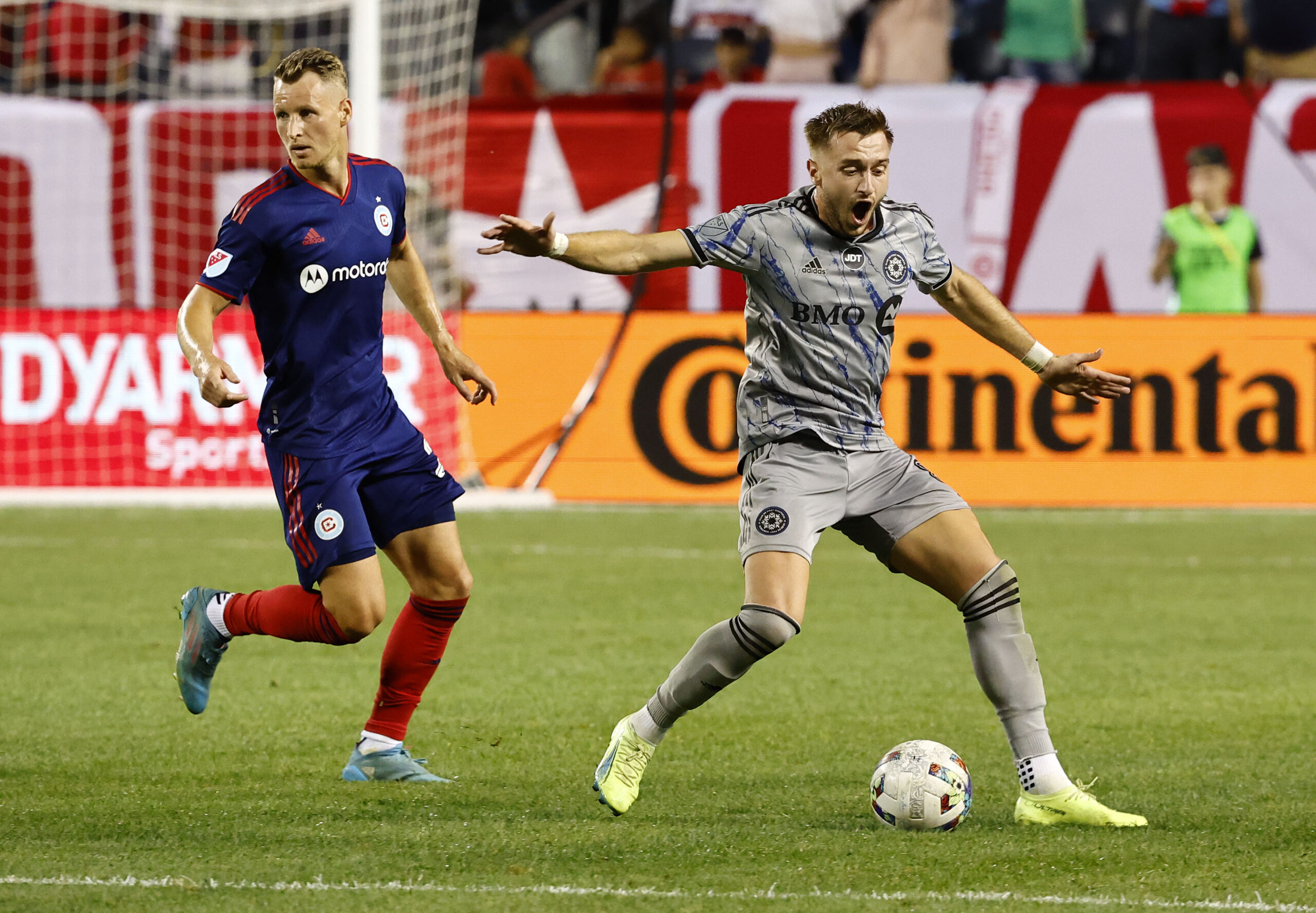 Aug 27, 2022; Chicago, Illinois, USA; CF Montreal midfielder Djordje Mihailovic (8) reacts after a foul against the Chicago Fire during the second half at Soldier Field. Mandatory Credit: Mike Dinovo-Imagn Images