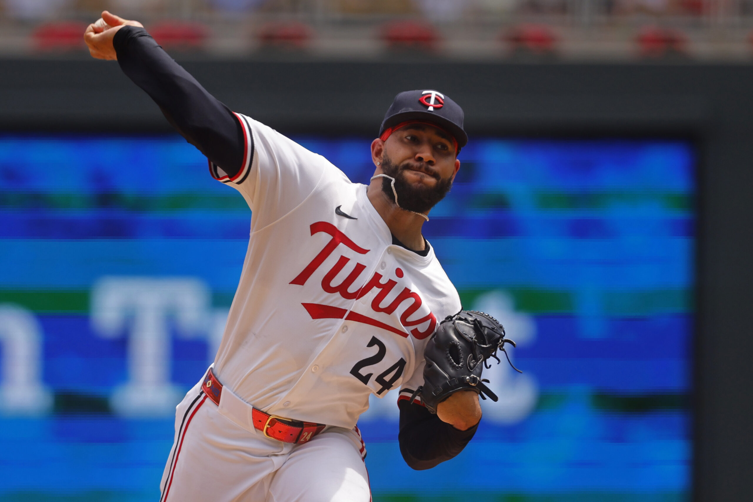 Jun 21, 2025; Minneapolis, Minnesota, USA; Minnesota Twins starting pitcher Simeon Woods Richardson (24) throws to the Milwaukee Brewers in the first inning at Target Field. Mandatory Credit: Bruce Kluckhohn-Imagn Images