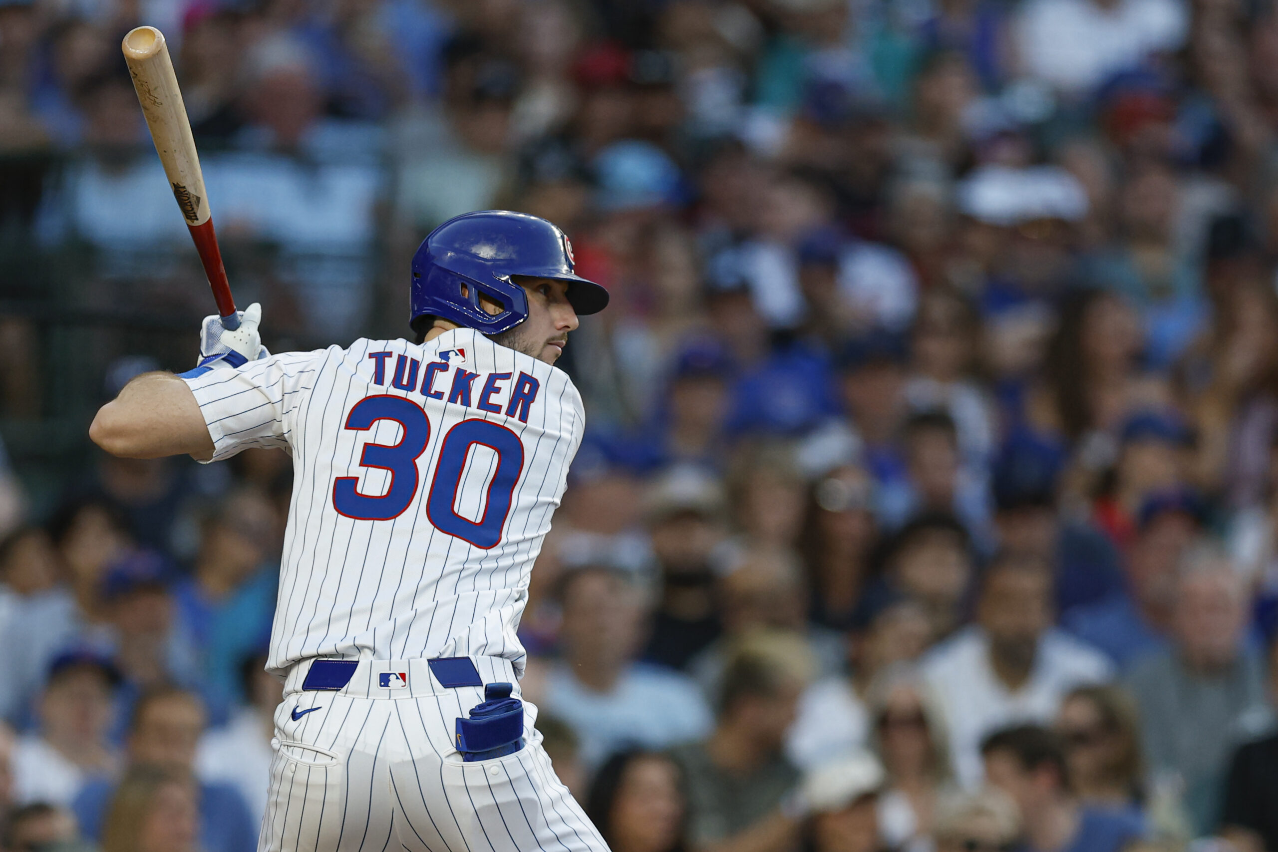 Jul 3, 2025; Chicago, Illinois, USA; Chicago Cubs right fielder Kyle Tucker (30) bats against the Cleveland Guardians during the third inning at Wrigley Field. Mandatory Credit: Kamil Krzaczynski-Imagn Images