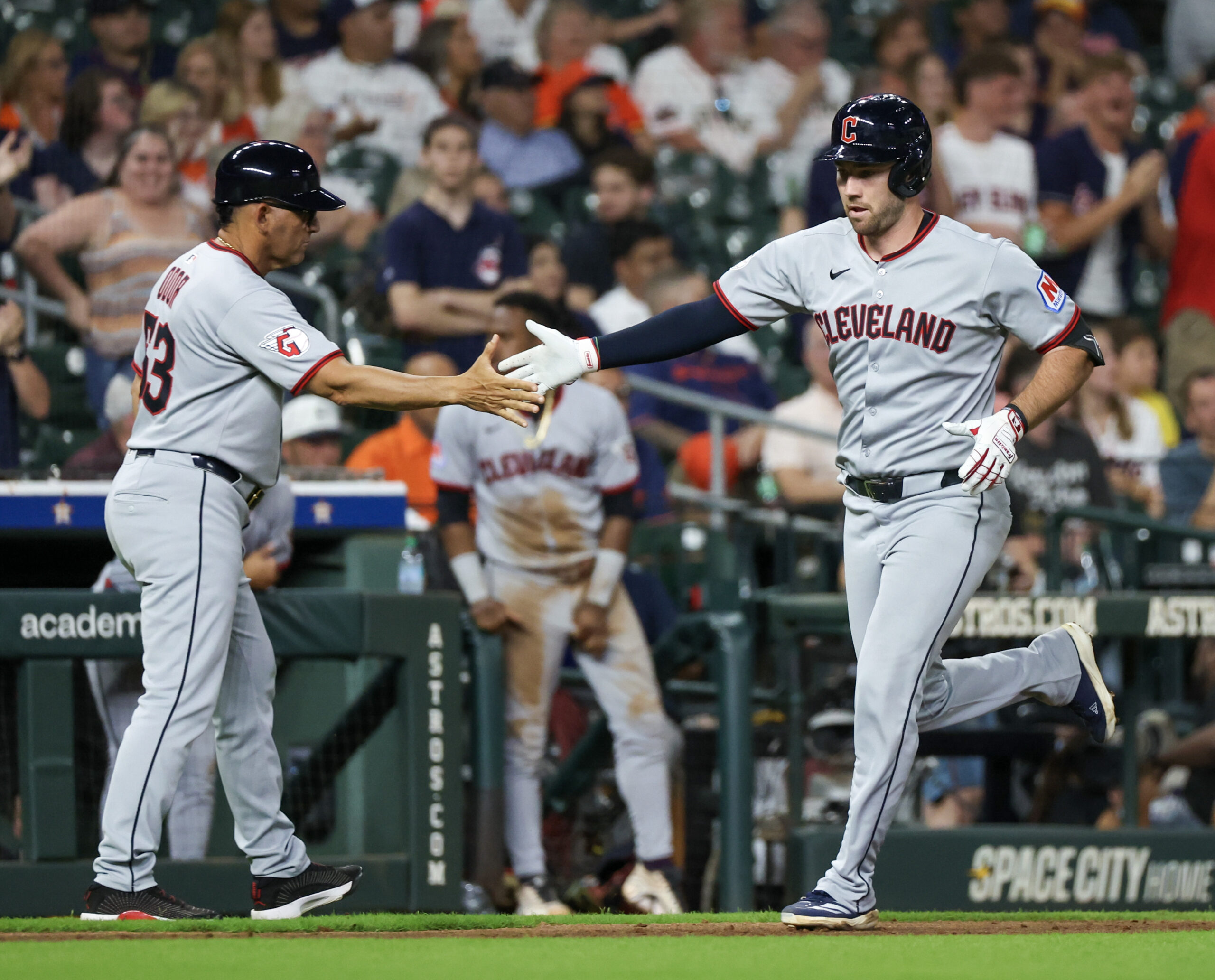 Jul 7, 2025; Houston, Texas, USA; Cleveland Guardians third base and infield coach Rouglas Odor (53) celebrates with designated hitter David Fry (6) after his home run against the Houston Astros in the ninth inning at Daikin Park. Mandatory Credit: Thomas Shea-Imagn Images