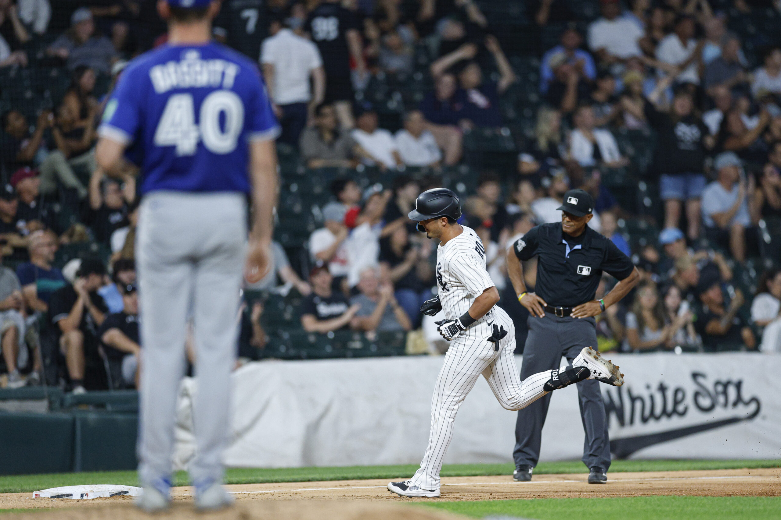 Jul 8, 2025; Chicago, Illinois, USA; Chicago White Sox third baseman Josh Rojas (5) rounds the bases after hitting a solo home run against the Toronto Blue Jays during the sixth inning at Rate Field. Mandatory Credit: Kamil Krzaczynski-Imagn Images