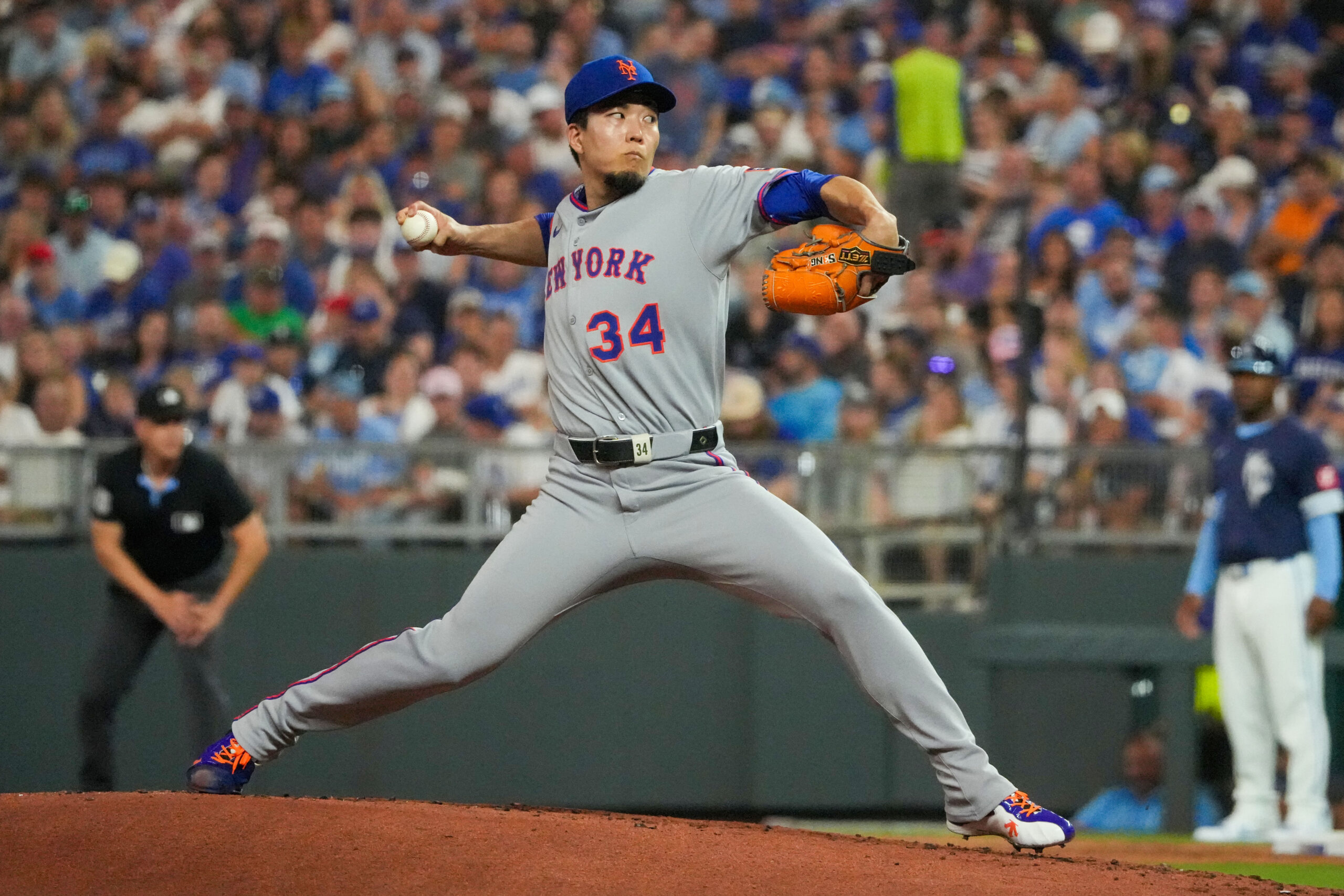 Jul 11, 2025; Kansas City, Missouri, USA; New York Mets starting pitcher Kodai Senga (34) delivers a pitch against the Kansas City Royals during the first inning at Kauffman Stadium. Mandatory Credit: Denny Medley-Imagn Images