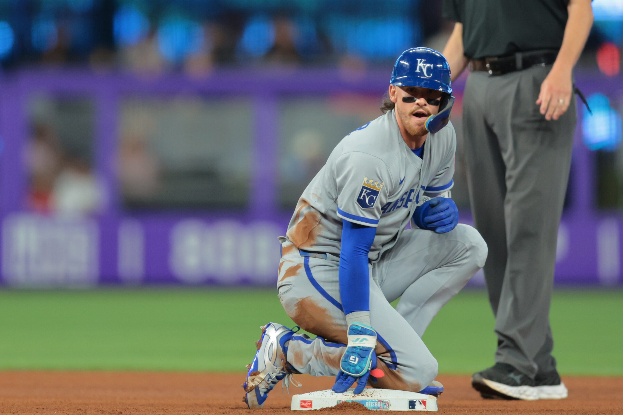 Jul 20, 2025; Miami, Florida, USA; Kansas City Royals shortstop Bobby Witt Jr. (7) looks on from second base after hitting a double against the Miami Marlins during the fourth inning at loanDepot Park. Mandatory Credit: Sam Navarro-Imagn Images