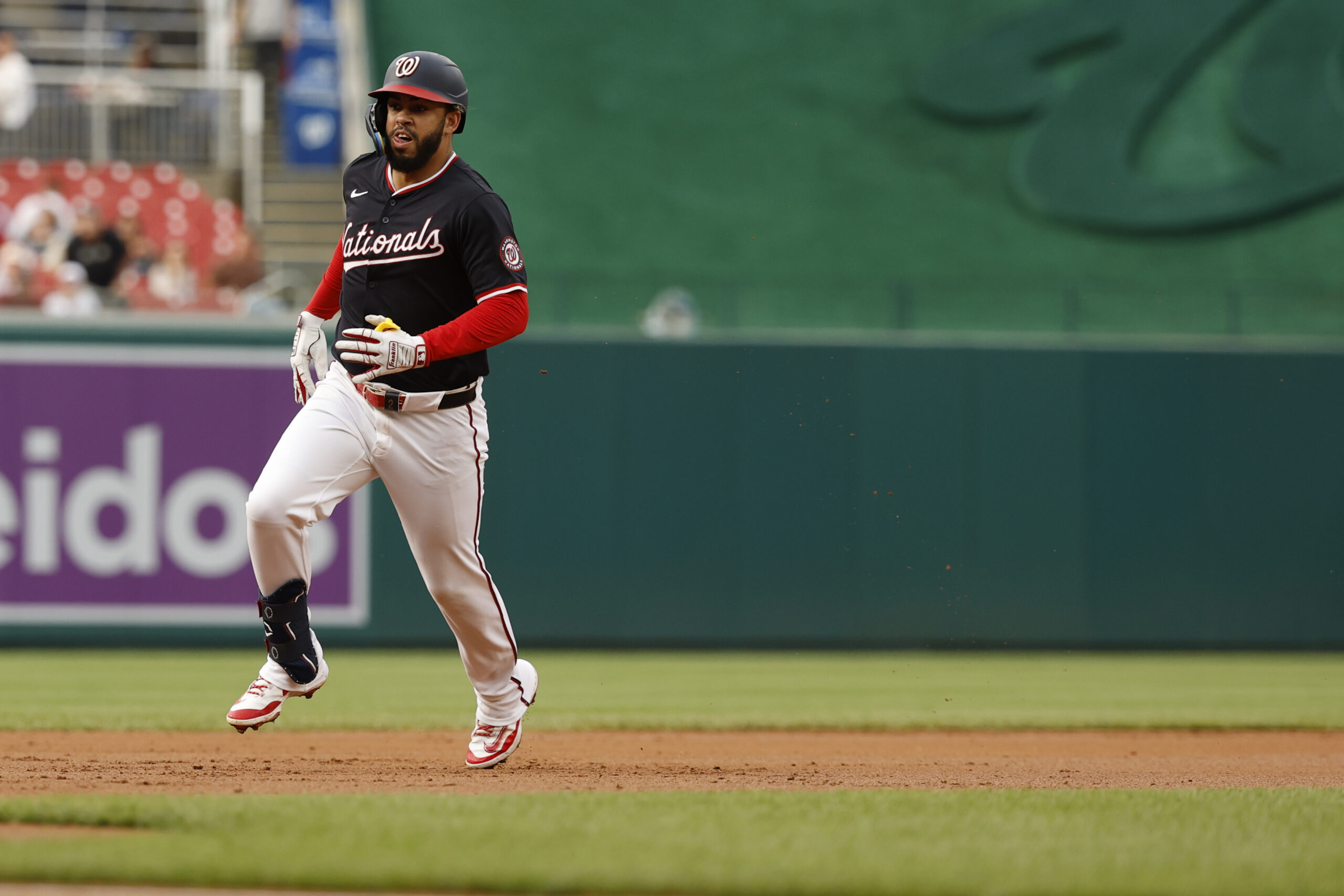 Jun 17, 2025; Washington, District of Columbia, USA; Washington Nationals second baseman Luis GarcĂa Jr. (2) advances to third base on a fielding error by Colorado Rockies outfielder Brenton Doyle (not pictured) during the first inning at Nationals Park. Mandatory Credit: Geoff Burke-Imagn Images