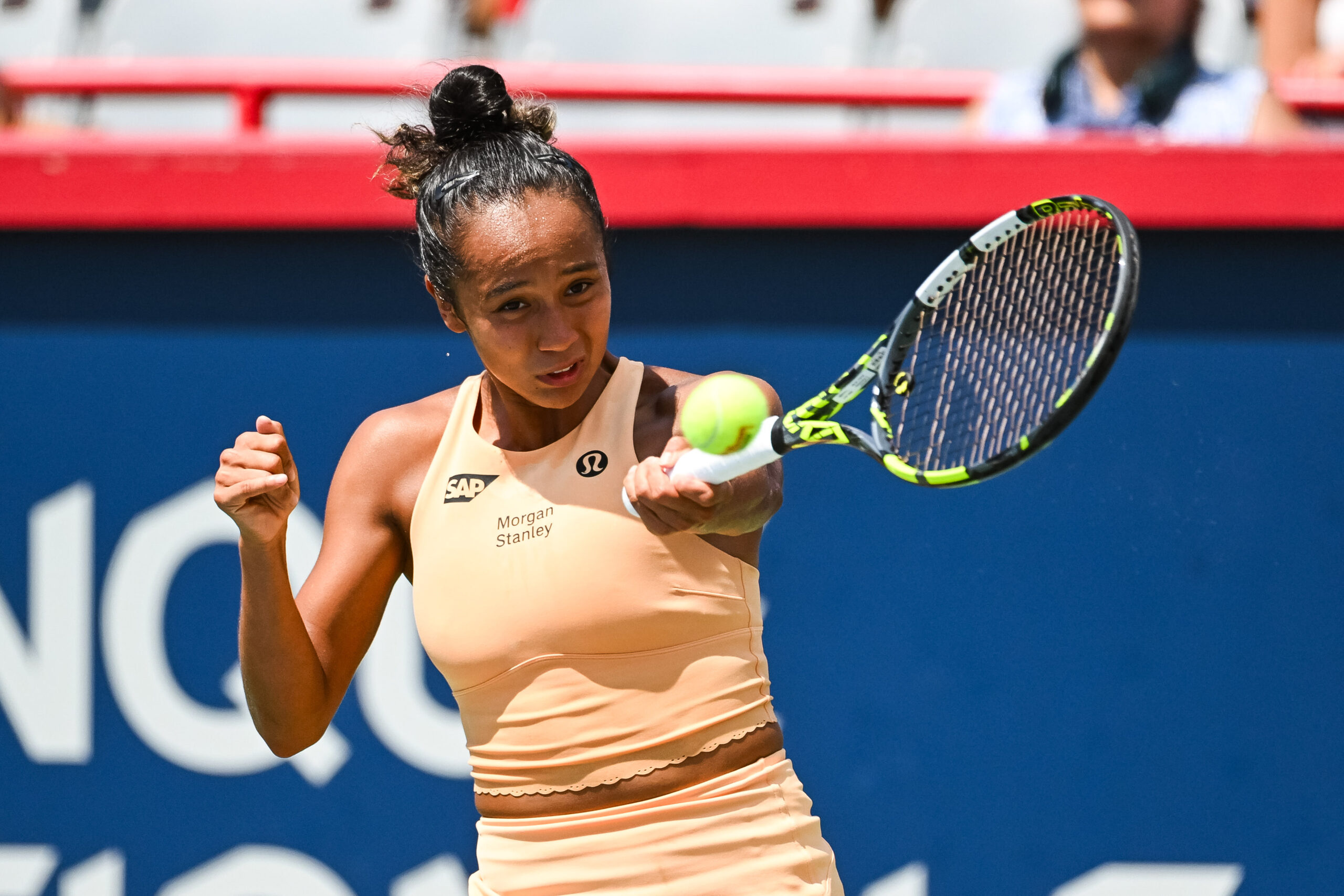 Jul 29, 2025; Montreal, QC, Canada; Leylah Fernandez (CAN) returns the ball to Maya Joint (AUS) in first round play at IGA Stadium. Mandatory Credit: David Kirouac-Imagn Images