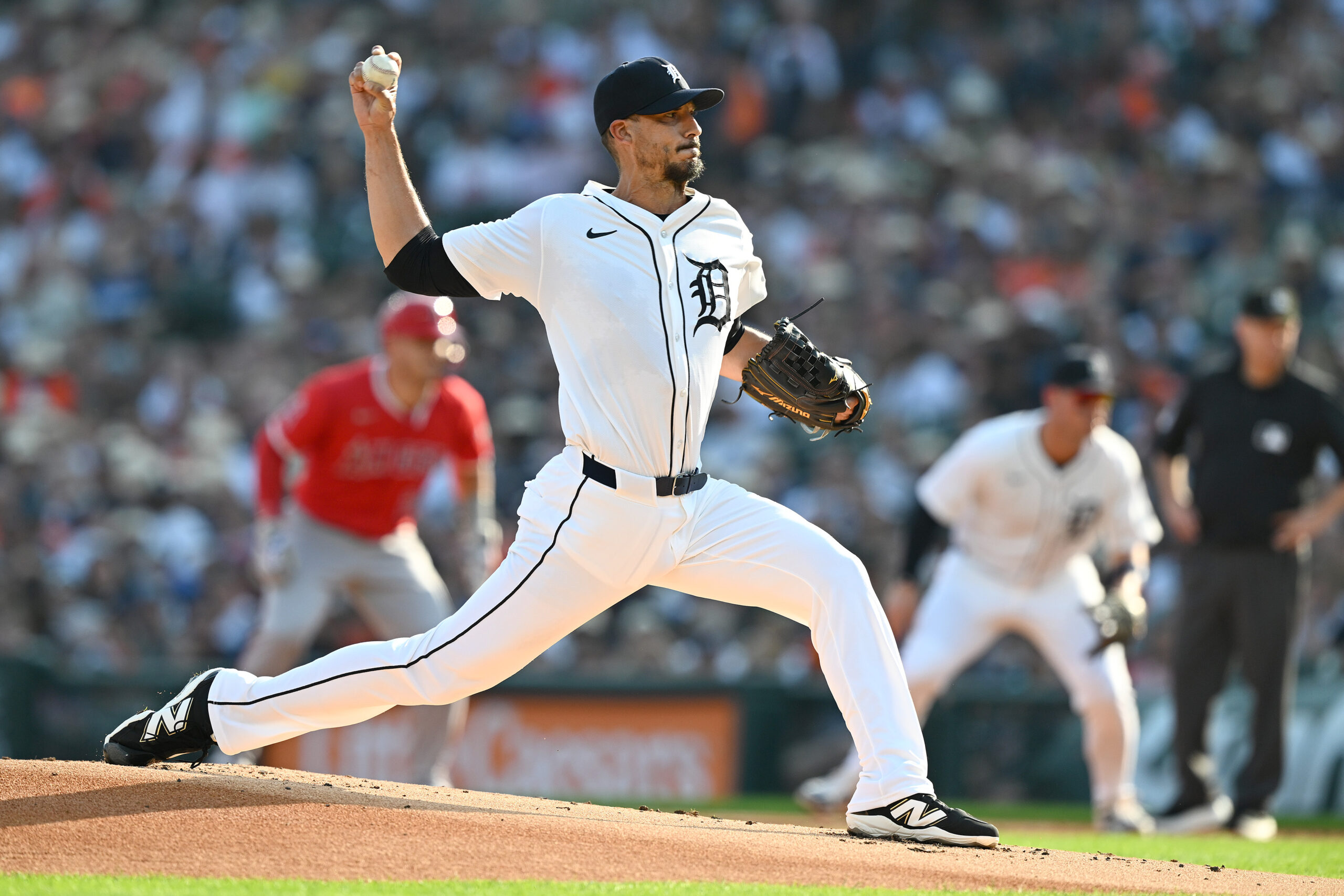 Aug 9, 2025; Detroit, Michigan, USA;  Detroit Tigers starting pitcher Charlie Morton (50) throws a pitch against the Los Angeles Angels in the first inning at Comerica Park. Mandatory Credit: Lon Horwedel-Imagn Images