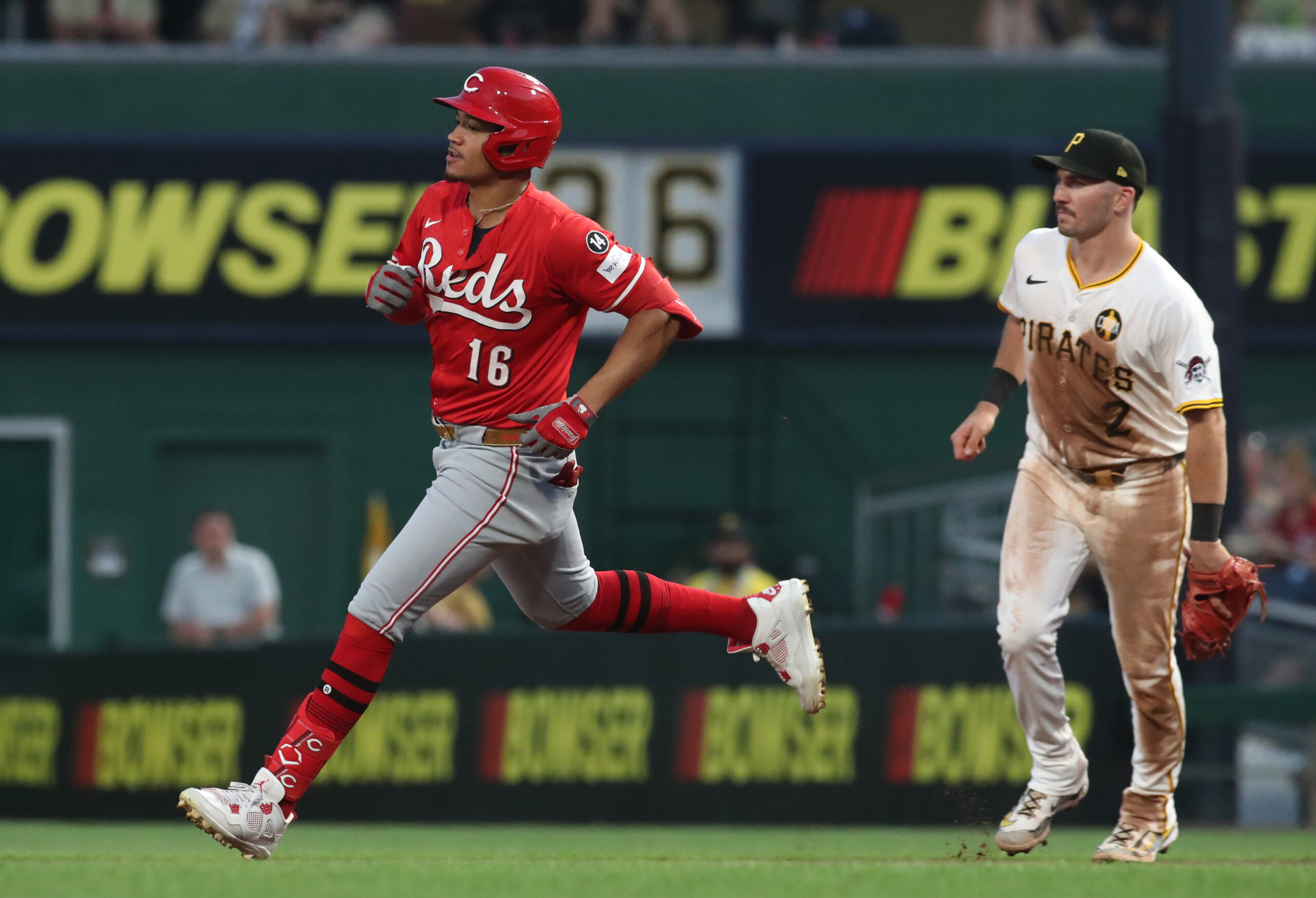 Aug 9, 2025; Pittsburgh, Pennsylvania, USA;  Cincinnati Reds right fielder Noelvi Marte (16) runs to second base with a double against the Pittsburgh Pirates seventh inning at PNC Park. Mandatory Credit: Charles LeClaire-Imagn Images