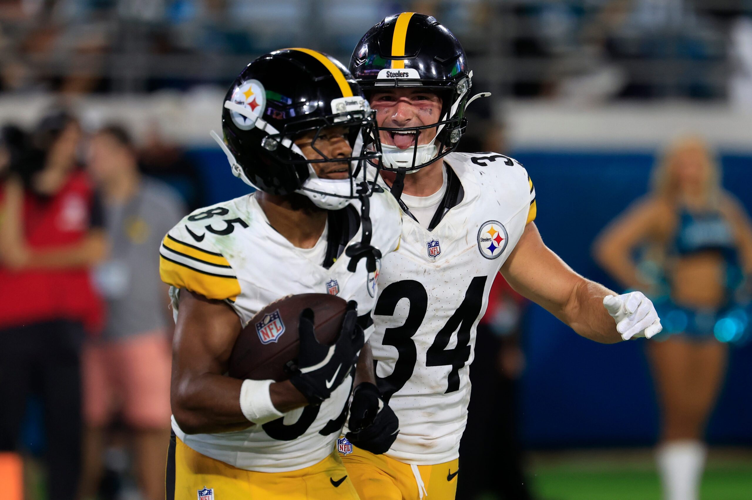 Pittsburgh Steelers wide receiver Ke'Shawn Williams (85) runs off the field with running back Lew Nichols (35) who reacts to Williams’ touchdown score during the fourth quarter of an NFL preseason matchup at EverBank Stadium, Saturday, Aug. 9, 2025 in Jacksonville, Fla. The Steelers defeated the Jaguars 31-25. [Corey Perrine/Florida Times-Union]