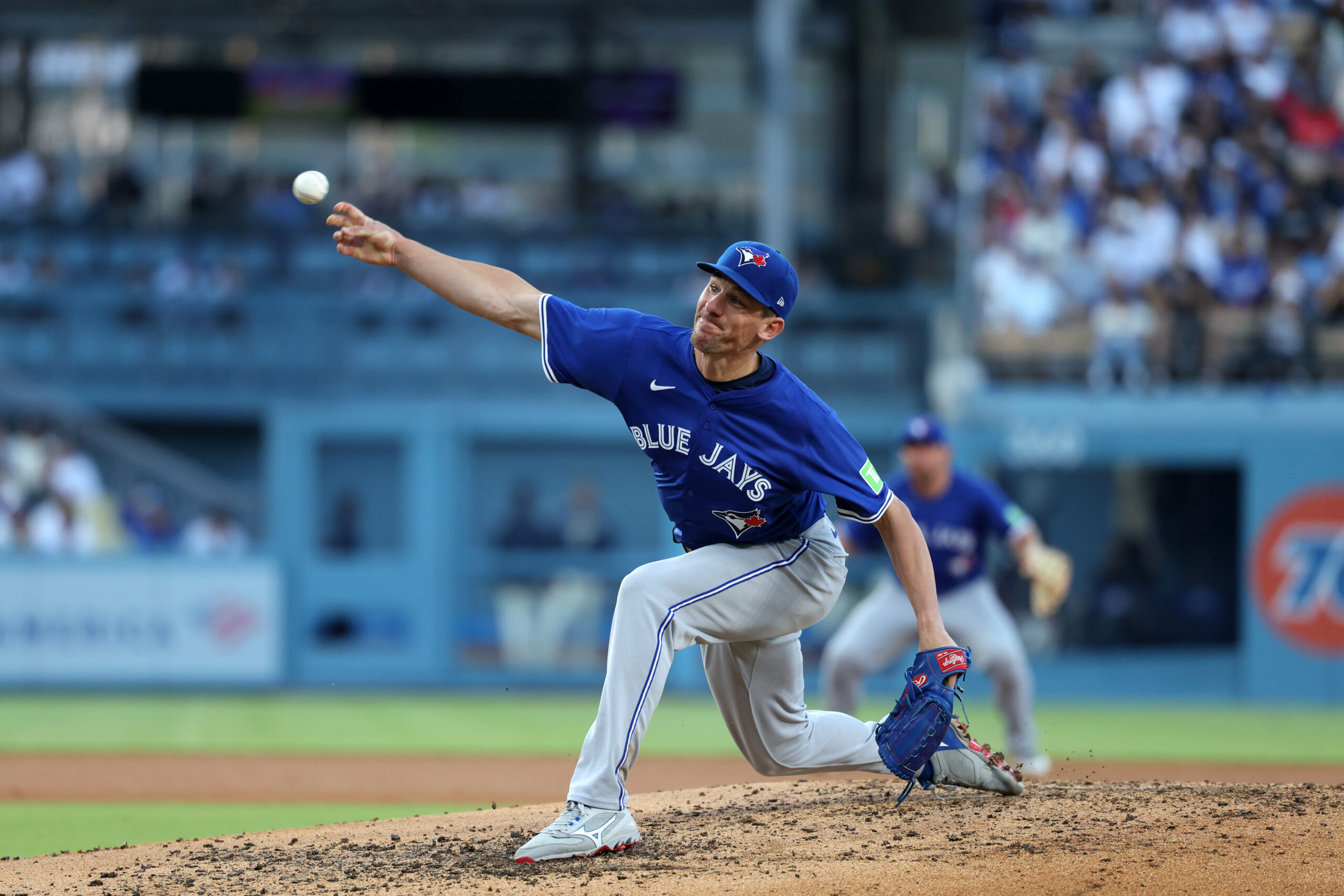 Aug 9, 2025; Los Angeles, California, USA;  Toronto Blue Jays starting pitcher Chris Bassitt (40) pitches during the fourth inning against the Los Angeles Dodgers at Dodger Stadium. Mandatory Credit: Kiyoshi Mio-Imagn Images
