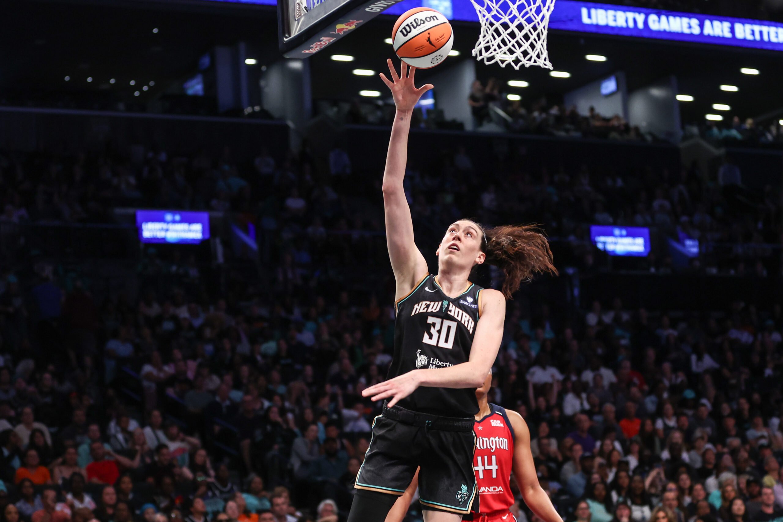 Aug 28, 2025; Brooklyn, New York, USA; New York Liberty forward Breanna Stewart (30) drives to the basket in the fourth quarter against the Washington Mystics at Barclays Center. Mandatory Credit: Wendell Cruz-Imagn Images