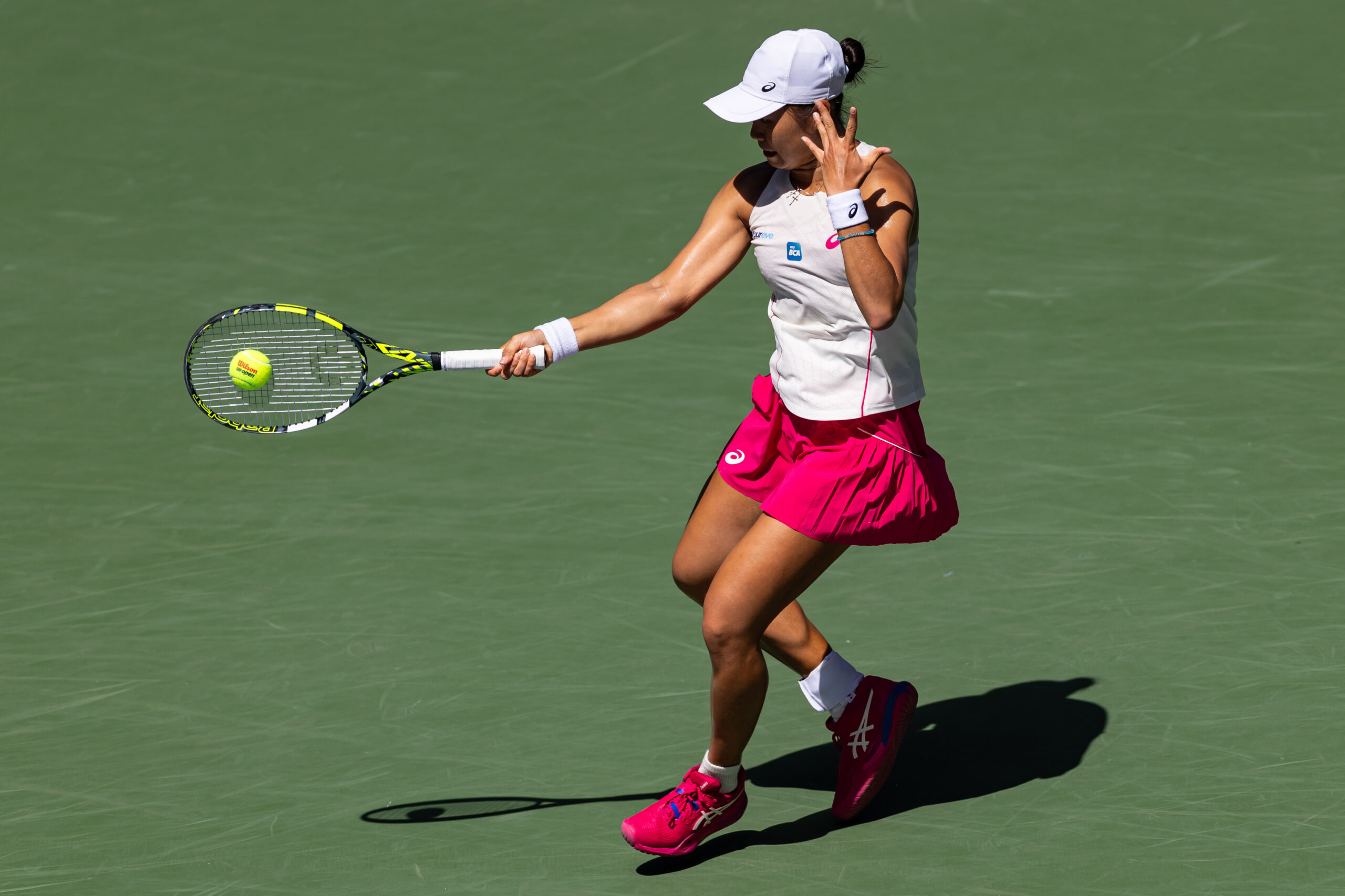Aug 27, 2025; Flushing, NY, USA; Janice Tjen of Indonesia in action against Emma Raducanu of United Kingdom in the second round of the womenÃs singles at the US Open at Louis Armstrong Stadium in Billie Jean King National Tennis Center. Mandatory Credit: Mike Frey-Imagn Images