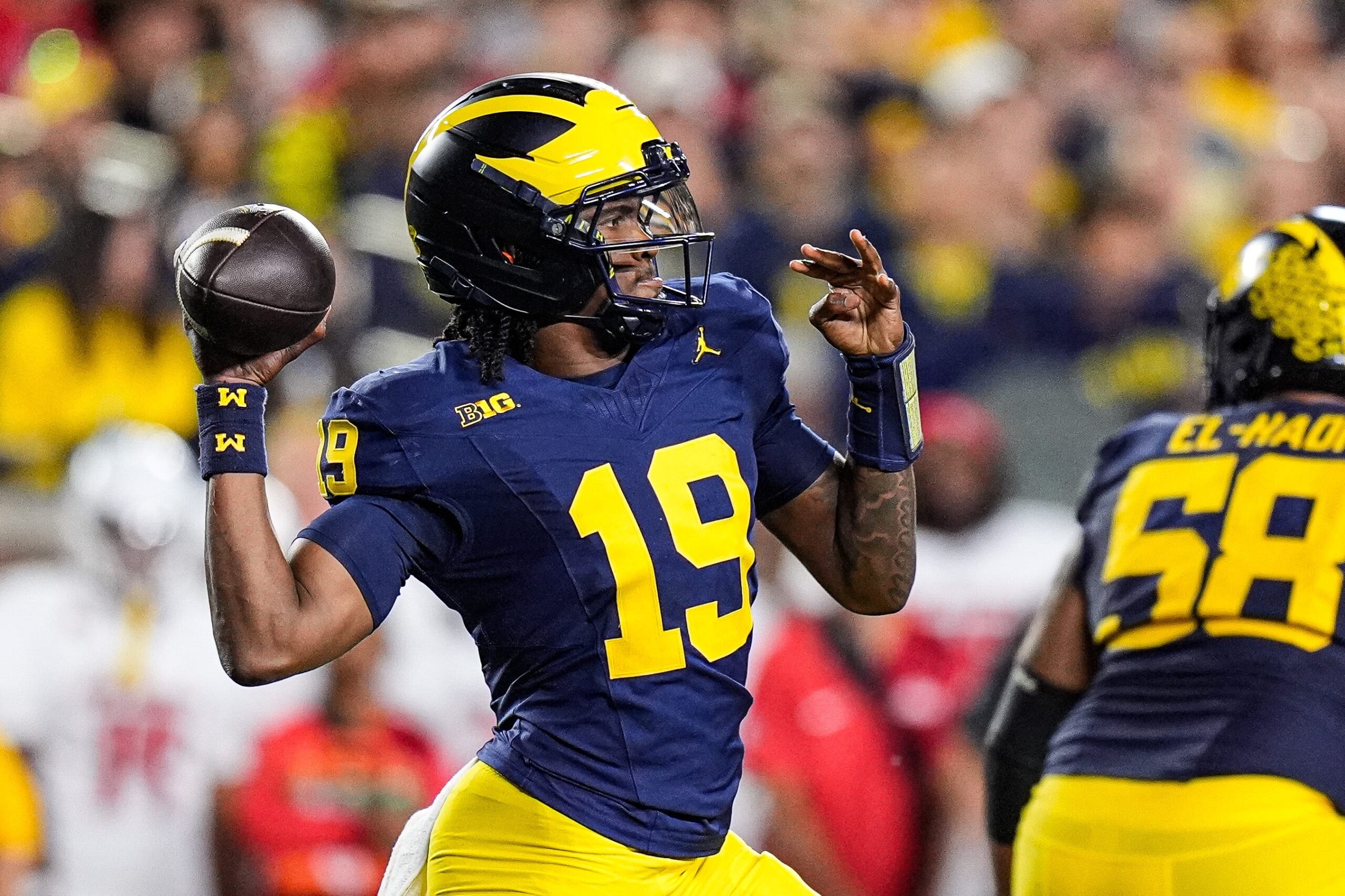 Michigan quarterback Bryce Underwood passes against New Mexico during the first half at Michigan Stadium in Ann Arbor on Saturday, August 30, 2025.