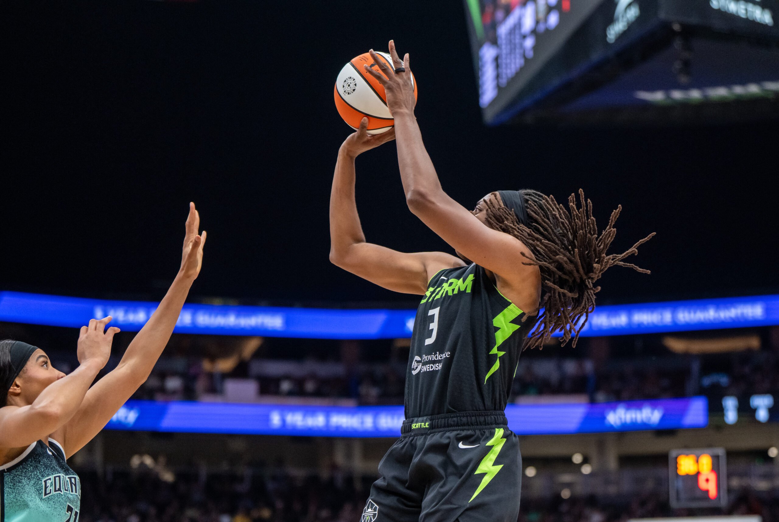 Sep 5, 2025; Seattle, Washington, USA; Seattle Storm forward Nneka Ogwumike (3) shoots the ball against New York Liberty forward Isabelle Harrison (21) during the second half at Climate Pledge Arena. Mandatory Credit: Stephen Brashear-Imagn Images