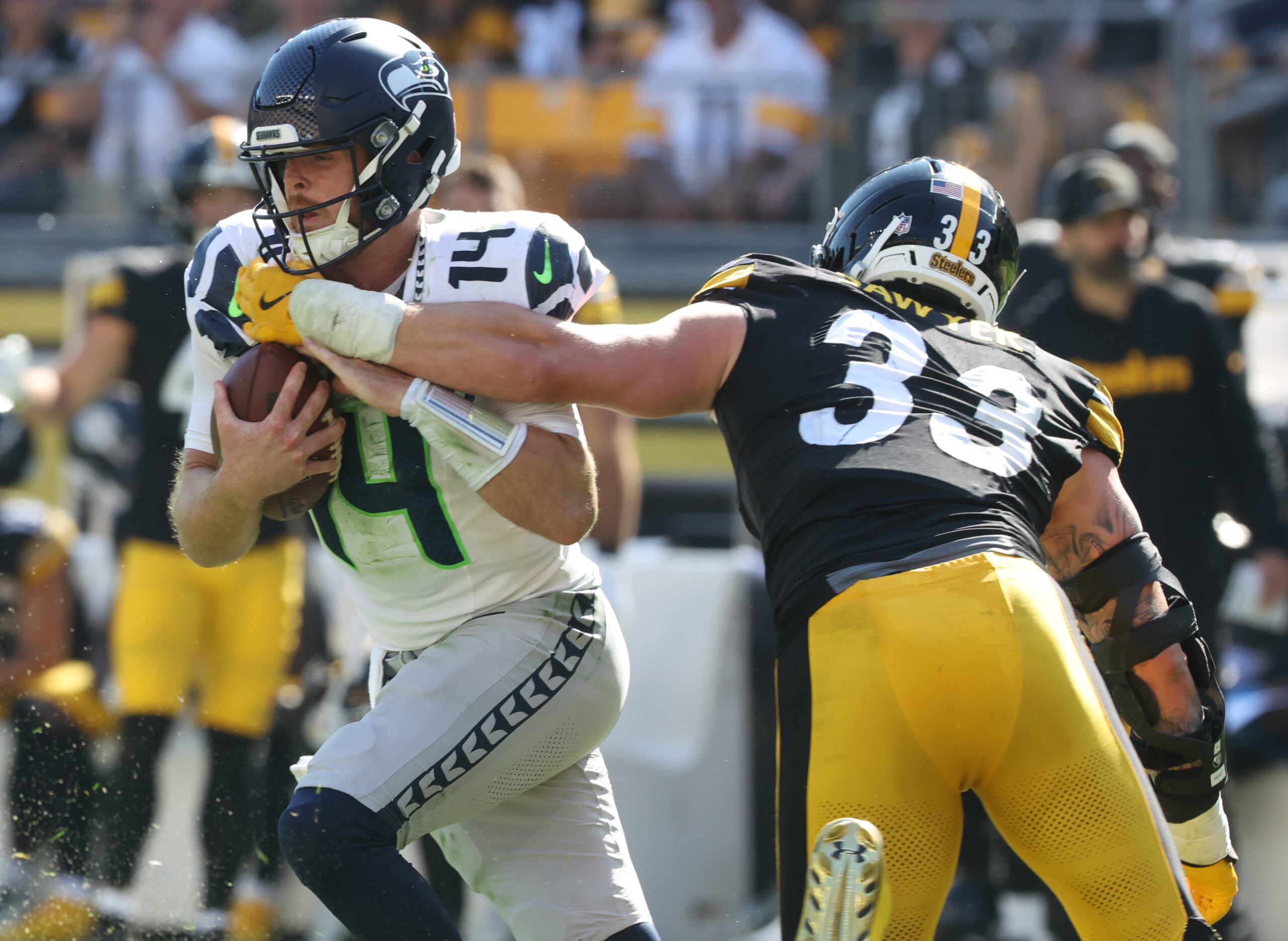 Sep 14, 2025; Pittsburgh, Pennsylvania, USA;  Pittsburgh Steelers linebacker Jack Sawyer (33) sacks Seattle Seahawks quarterback Sam Darnold (14) during the fourth quarter at Acrisure Stadium. Mandatory Credit: Charles LeClaire-Imagn Images