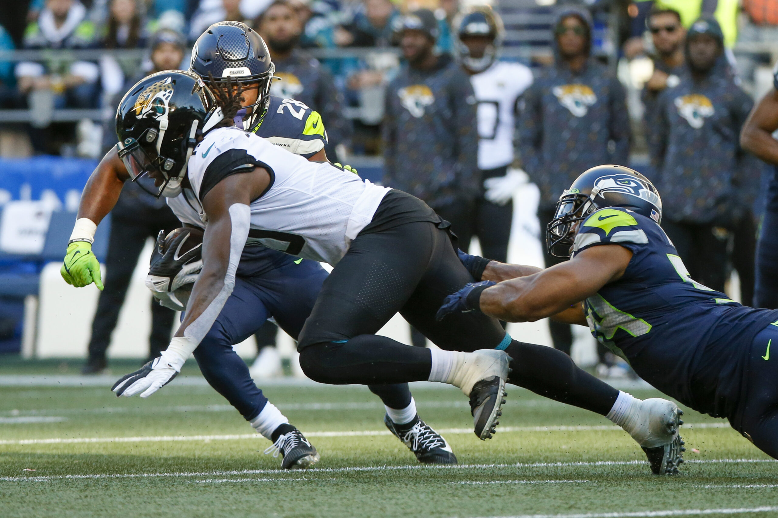 Oct 31, 2021; Seattle, Washington, USA; Jacksonville Jaguars wide receiver Laviska Shenault Jr. (10) runs for yards after the catch as Seattle Seahawks middle linebacker Bobby Wagner (54) reaches for a tackle during the fourth quarter at Lumen Field. Mandatory Credit: Joe Nicholson-Imagn Images