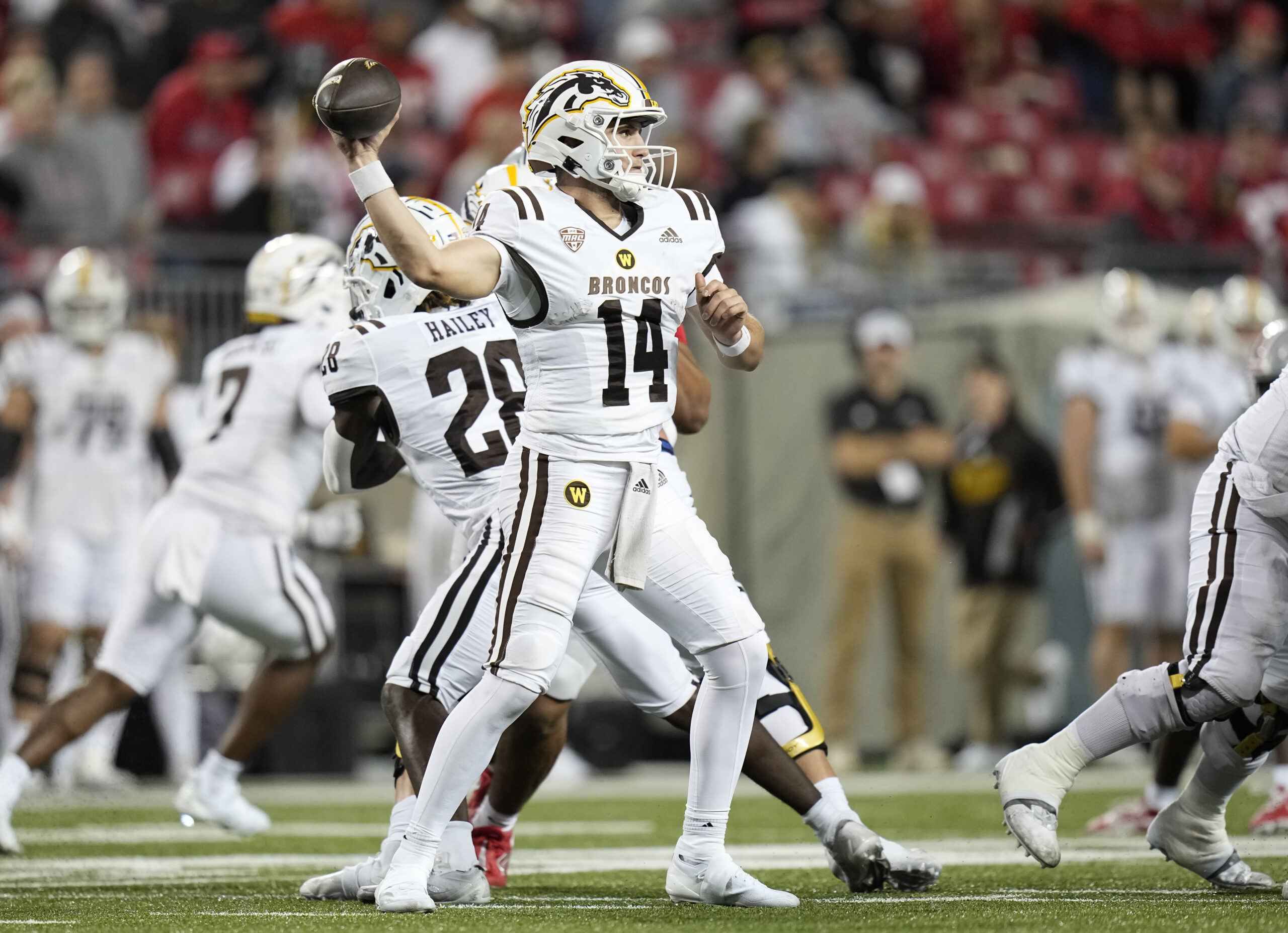 Sep 7, 2024; Columbus, Ohio, USA;  Western Michigan Broncos quarterback Broc Lowry (14) throws a pass against the Ohio State Buckeyes during the second half at Ohio Stadium.  Mandatory Credit: Adam Cairns-Imagn Images