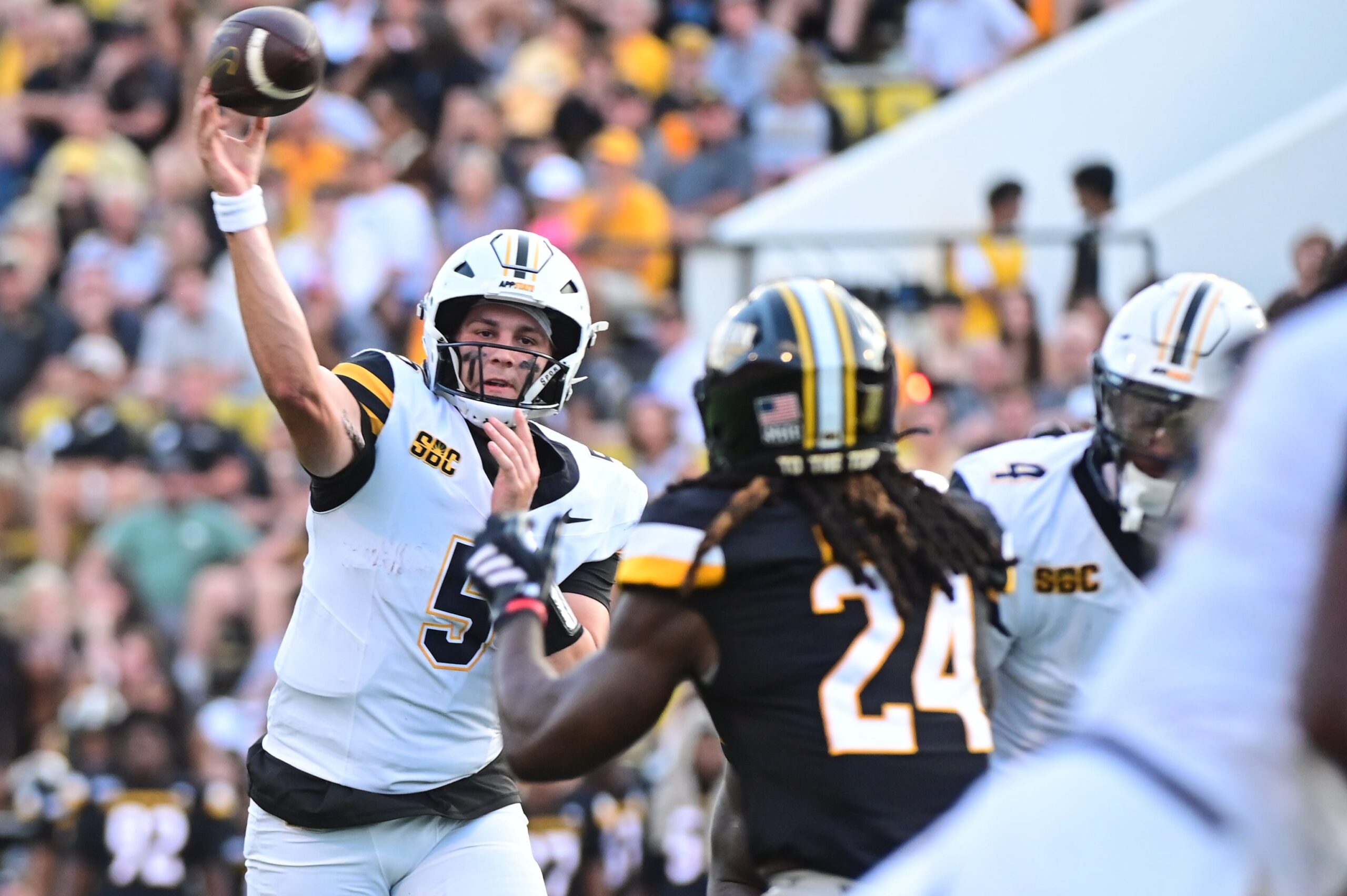 Appalachian State Mountaineers quarterback AJ Swann (5) makes a pass against the Southern Miss Golden Eagles during the first quarter at M.M. Roberts Stadium in Hattiesburg, Mississippi, on September 13, 2025.