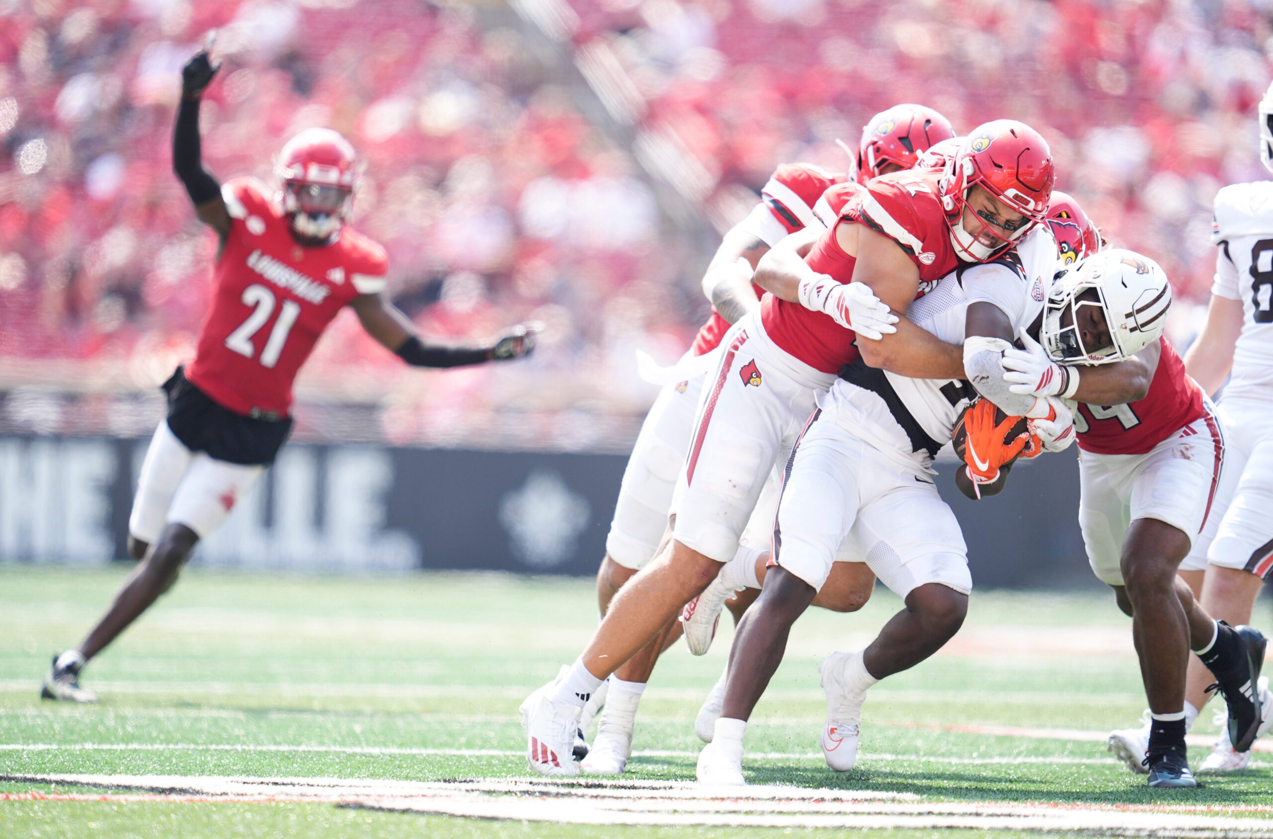 Louisville Cardinals linebacker Kalib Perry stops Bowling Green Falcons running back Chris McMillian as the Cards (3-0) cruised past Bowling Green 40-17 in football Saturday, Sept. 20, 2025, in Louisville, Kentucky