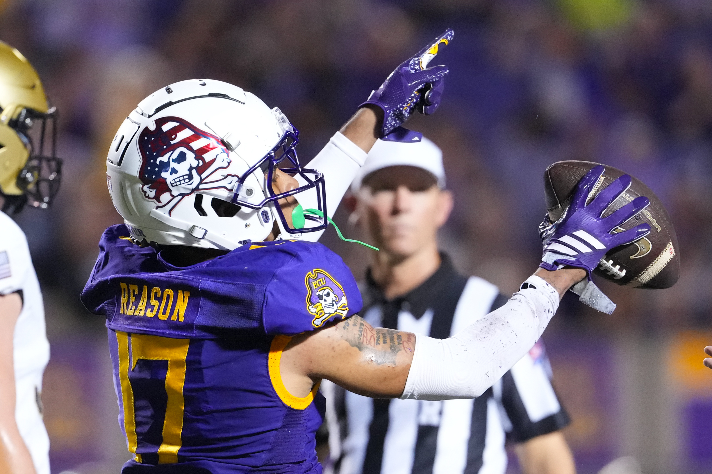 Sep 25, 2025; Greenville, North Carolina, USA;  East Carolina Pirates defensive back Rasheed Reason (17) celebrates his fumble recovery against the Army Black Knights during the first half at Dowdy-Ficklen Stadium. Mandatory Credit: James Guillory-Imagn Images