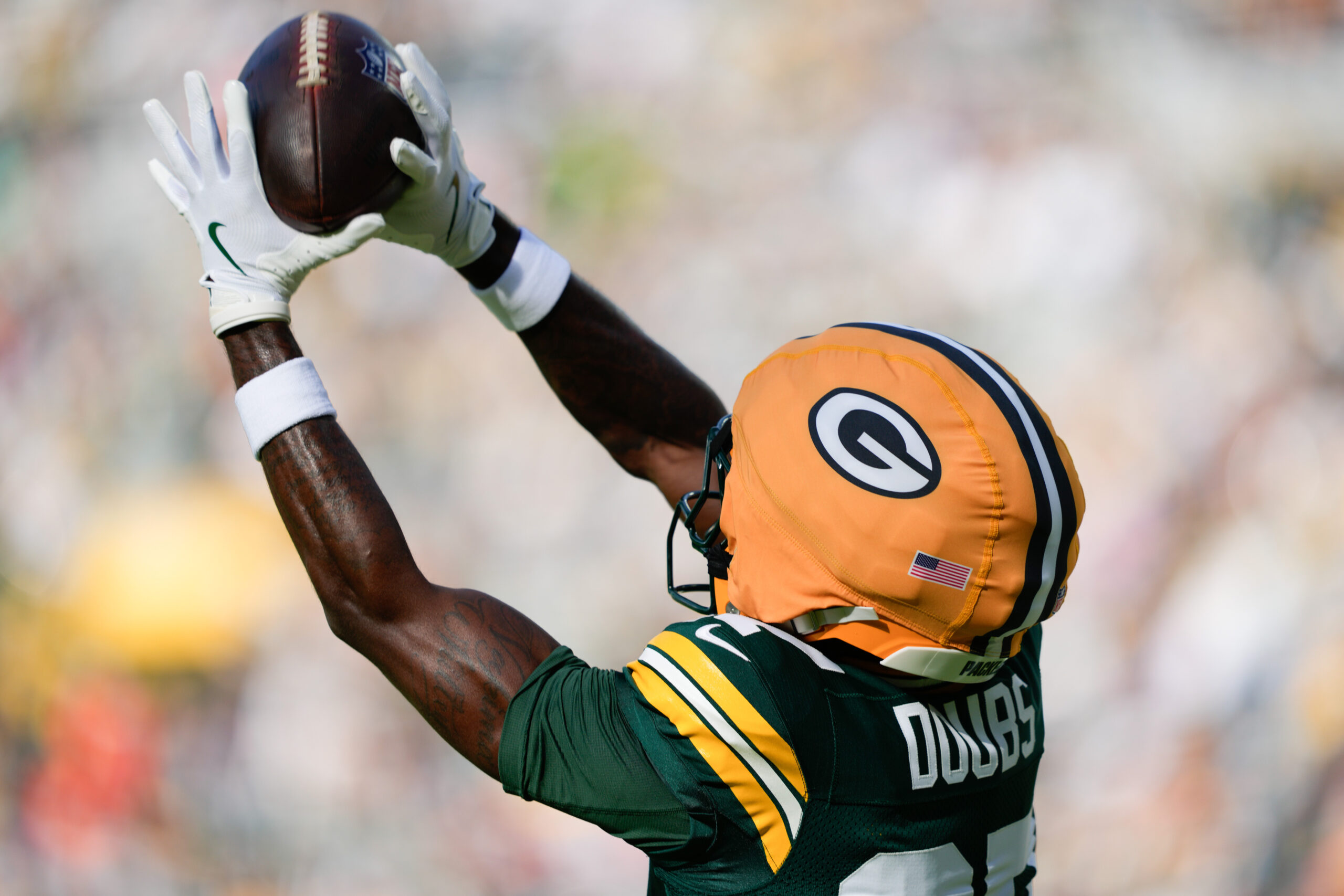 Oct 12, 2025; Green Bay, Wisconsin, USA; Green Bay Packers wide receiver Romeo Doubs (87) warms up prior to the game against Cincinnati Bengals at Lambeau Field. Mandatory Credit: Jeff Hanisch-Imagn Images