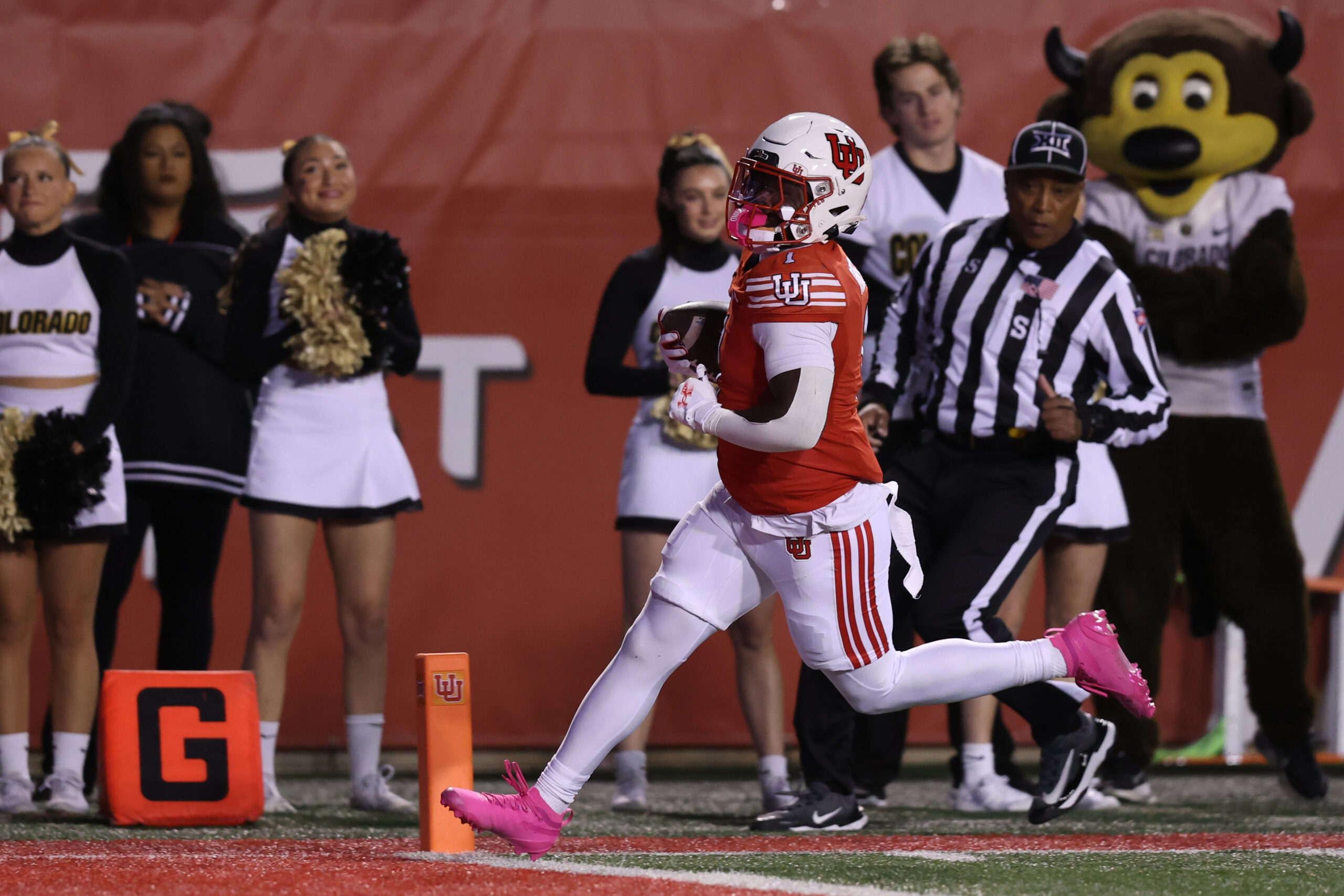 Oct 25, 2025; Salt Lake City, Utah, USA; Utah Utes running back Wayshawn Parker (1) runs the ball for a touchdown against the Colorado Buffaloes during the first quarter at Rice-Eccles Stadium. Mandatory Credit: Rob Gray-Imagn Images