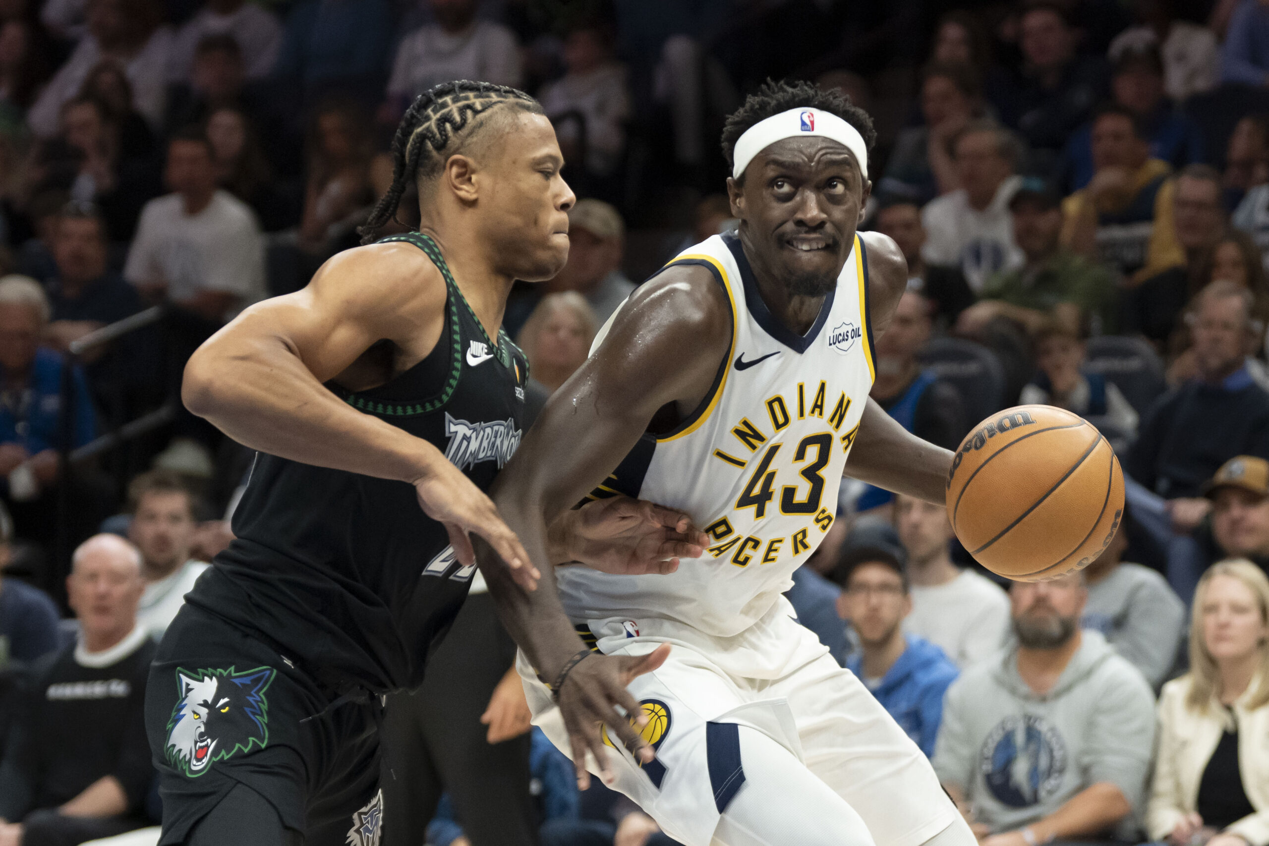 Oct 26, 2025; Minneapolis, Minnesota, USA; Indiana Pacers forward Pascal Siakam (43) dribbles the ball past Minnesota Timberwolves guard Jaylen Clark (22) in the second half at Target Center. Mandatory Credit: Jesse Johnson-Imagn Images