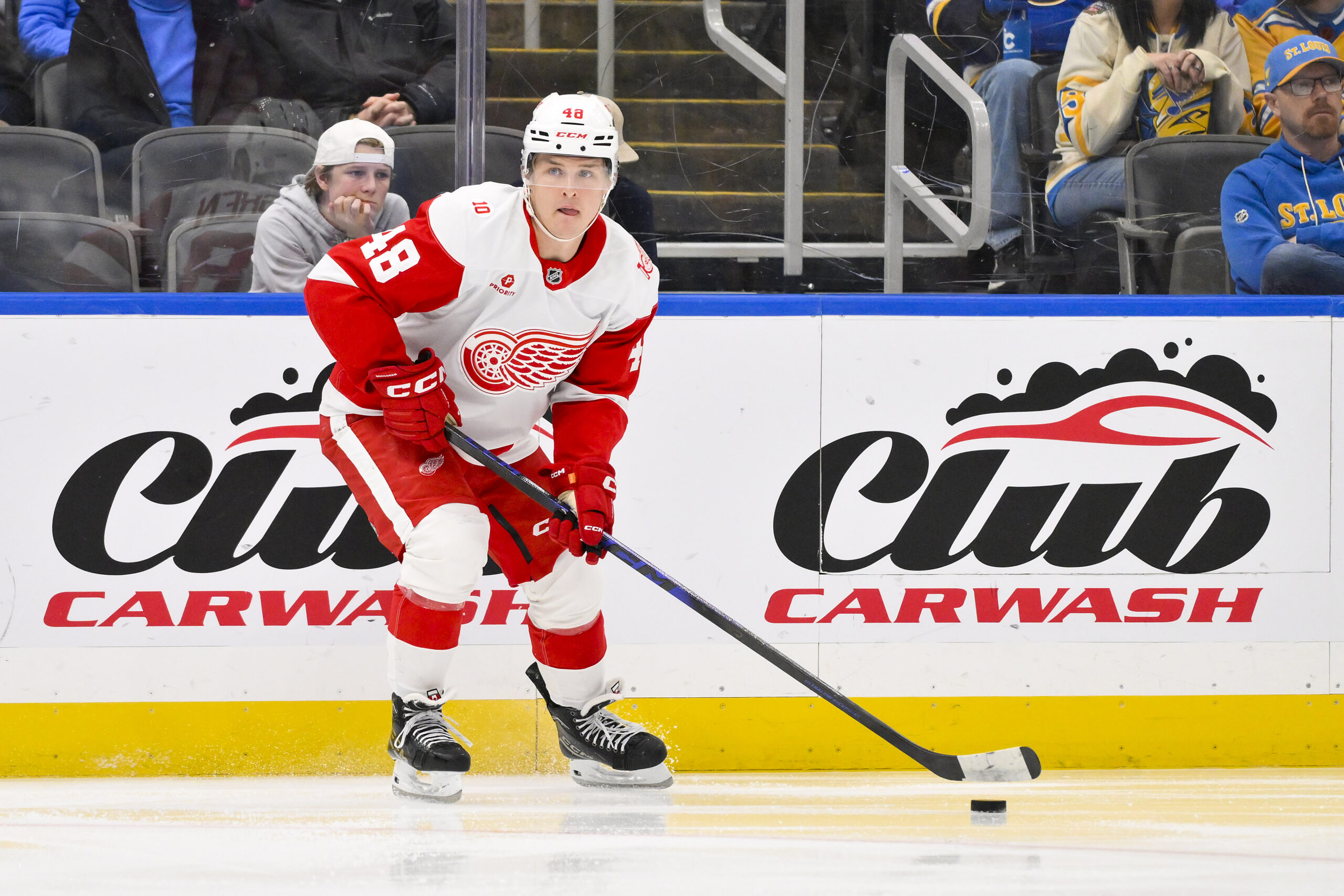 Oct 28, 2025; St. Louis, Missouri, USA; Detroit Red Wings right wing Jonatan Berggren (48) controls the puck against the St. Louis Blues during the third period at Enterprise Center. Mandatory Credit: Jeff Curry-Imagn Images
