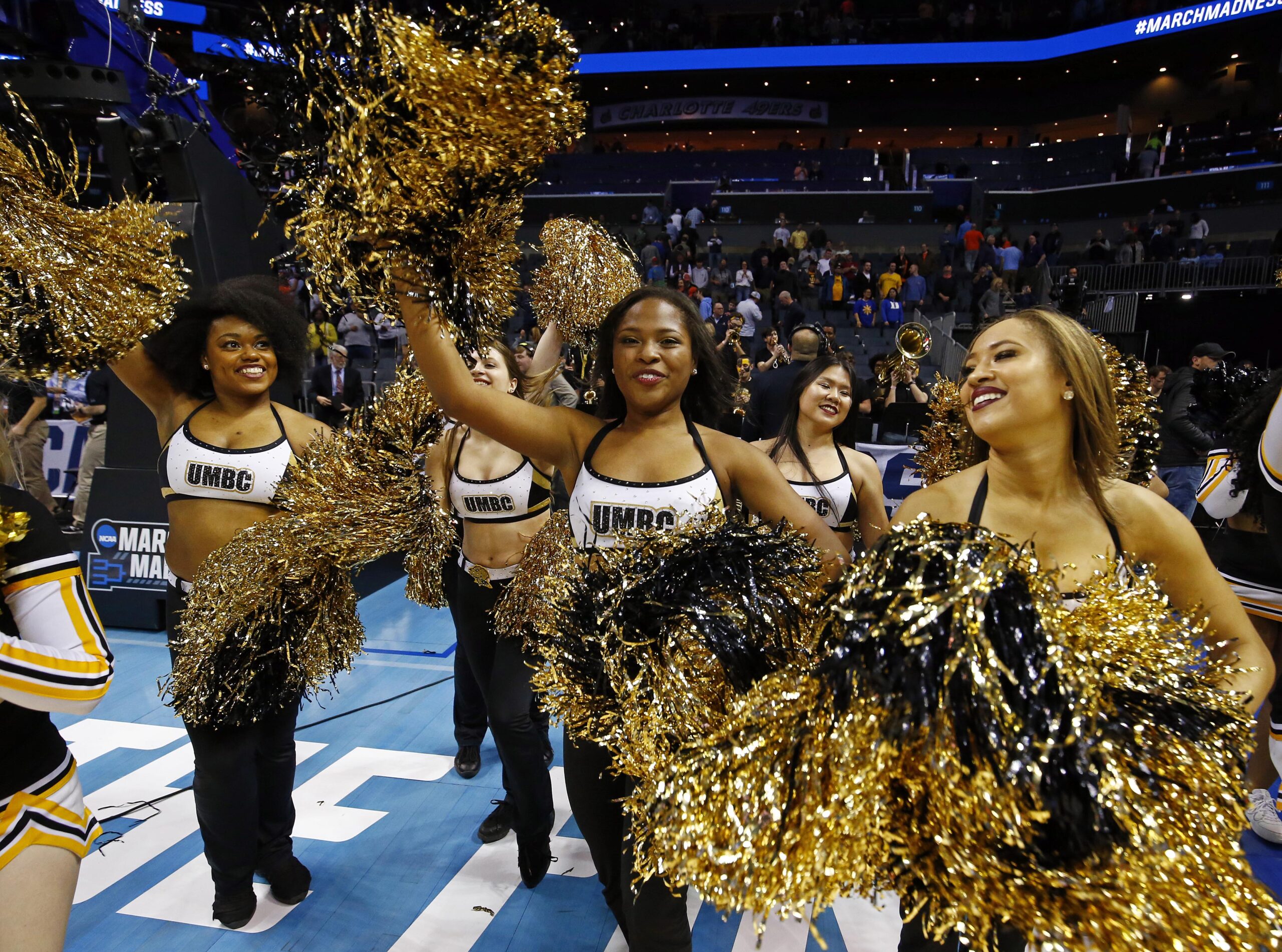 Mar 16, 2018; Charlotte, NC, USA; The UMBC Retrievers cheerleader after the game against Virginia Cavaliers in the first round of the 2018 NCAA Tournament at Spectrum Center. Mandatory Credit: Jeremy Brevard-Imagn Images