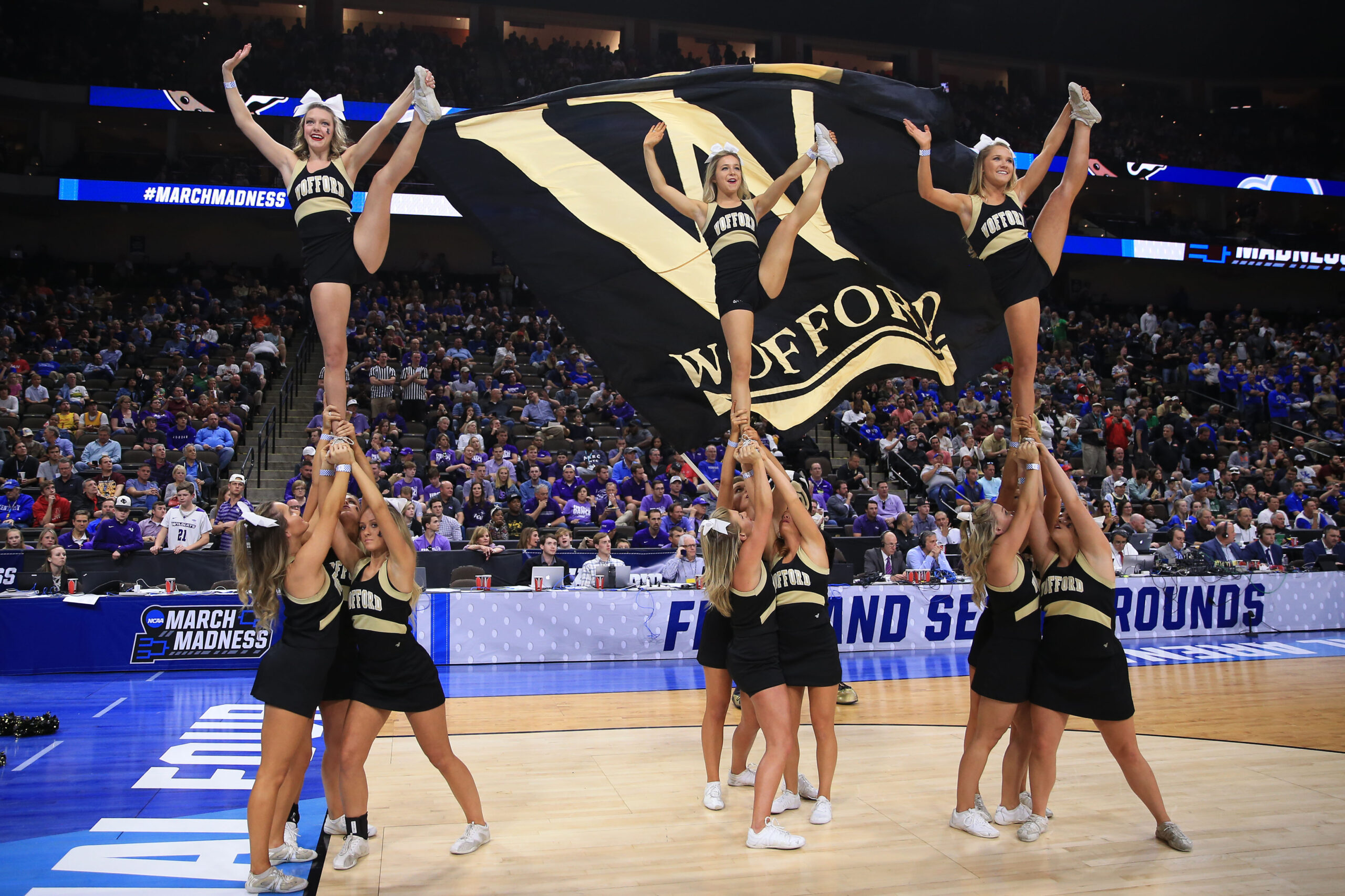 Mar 21, 2019; Jacksonville, FL, USA; The Wofford Terriers cheerleaders preform on the court prior to the game against the Seton Hall Pirates in the first round of the 2019 NCAA Tournament at Jacksonville Veterans Memorial Arena. Mandatory Credit: Matt Stamey-Imagn Images