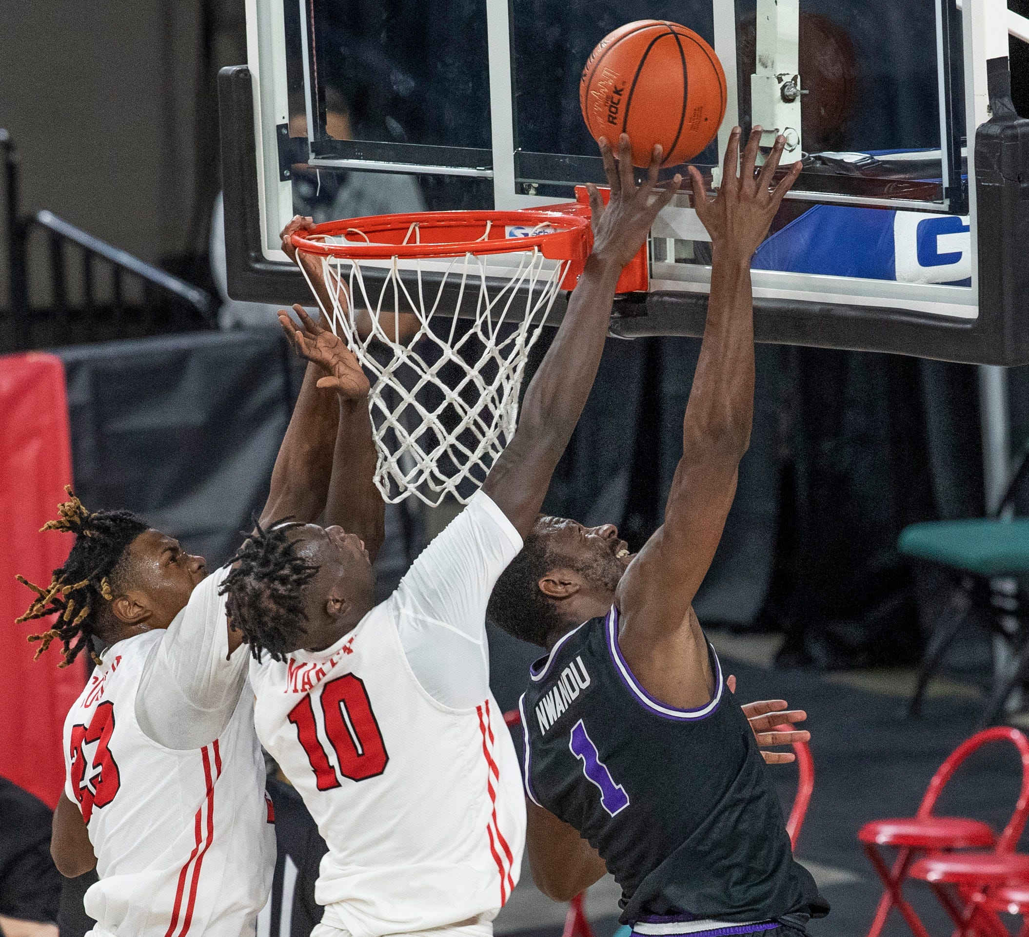 Marist Javon Cooley and Henry Makeny try to block shot by Niagara Kobi Nwandu during first half action. Marist vs Niagara in MAAC men's basketball tournament quarterfinal game in Atlantic City on March 11, 2021.
Maacmarist210311c
