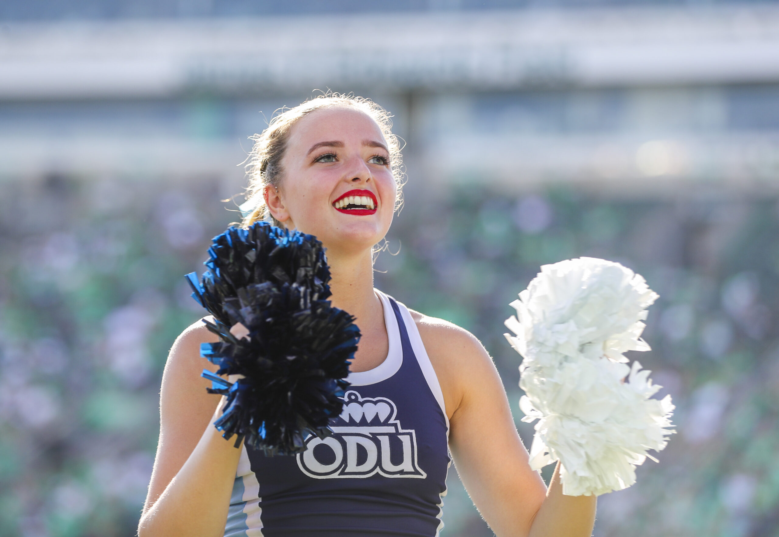 Oct 9, 2021; Huntington, West Virginia, USA; A Old Dominion Monarchs cheerleader performs during the third quarter against the Marshall Thundering Herd at Joan C. Edwards Stadium. Mandatory Credit: Ben Queen-Imagn Images