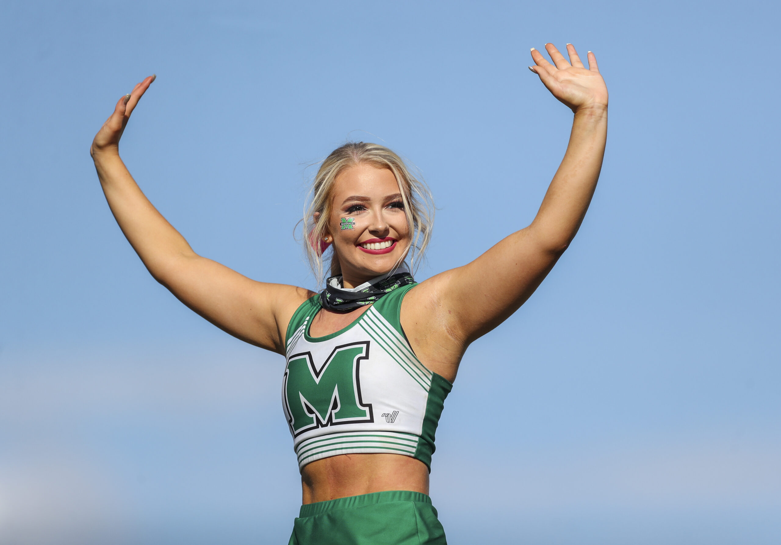 Oct 9, 2021; Huntington, West Virginia, USA; A Marshall Thundering Herd cheerleader performs during the third quarter against the Old Dominion Monarchs at Joan C. Edwards Stadium. Mandatory Credit: Ben Queen-Imagn Images