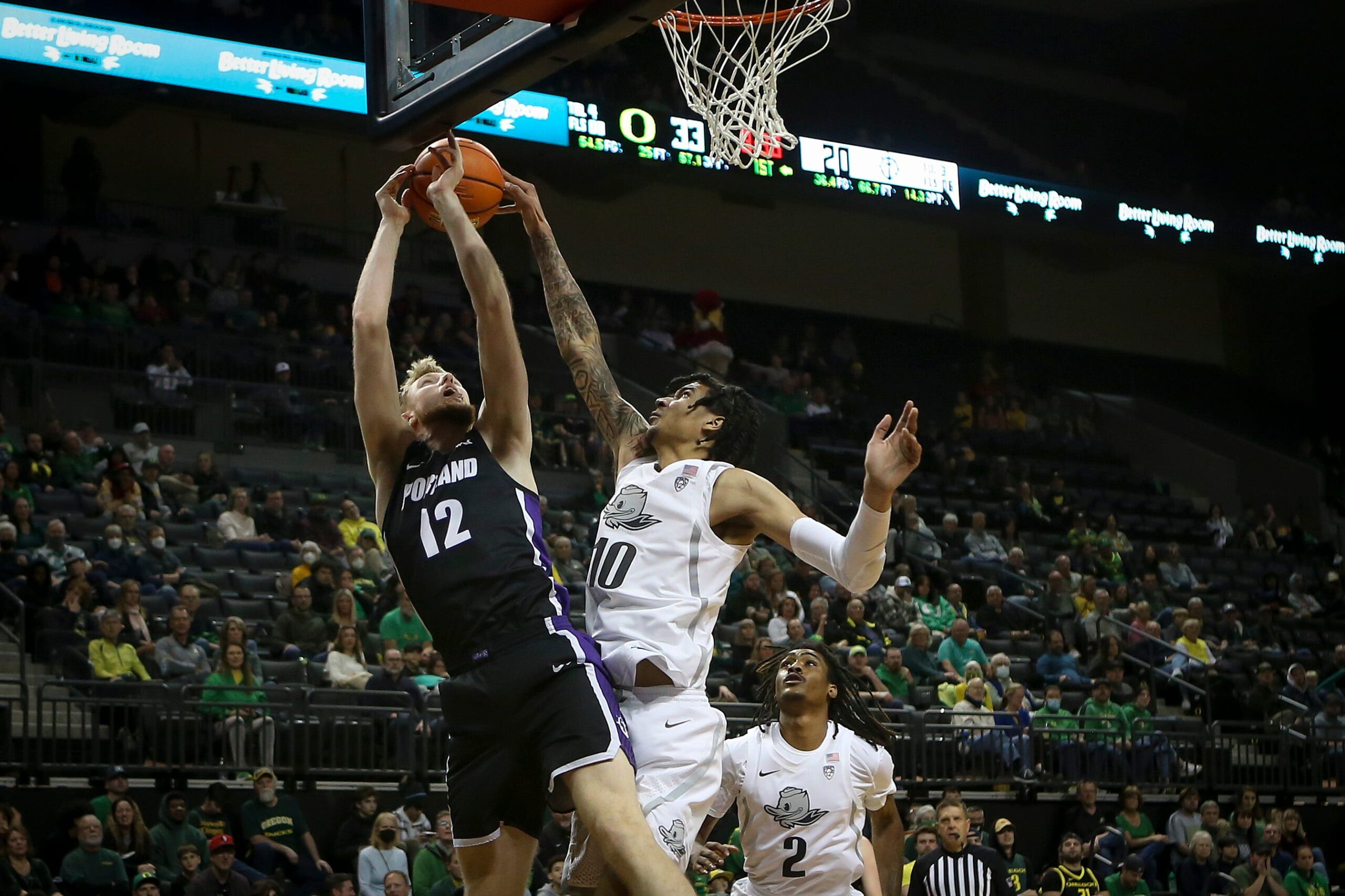 Oregon center Kel'el Ware blocks a shot by Portland forward Kristian Sjolund as the Oregon Ducks host the Portland Pilots Saturday, Dec. 17, 2022, at Matthew Knight Arena in Eugene, Ore.

Ncaa Basketball Oregon Ducks Vs Portland Pilots Men S Basketball Portland Pilots At Oregon Ducks