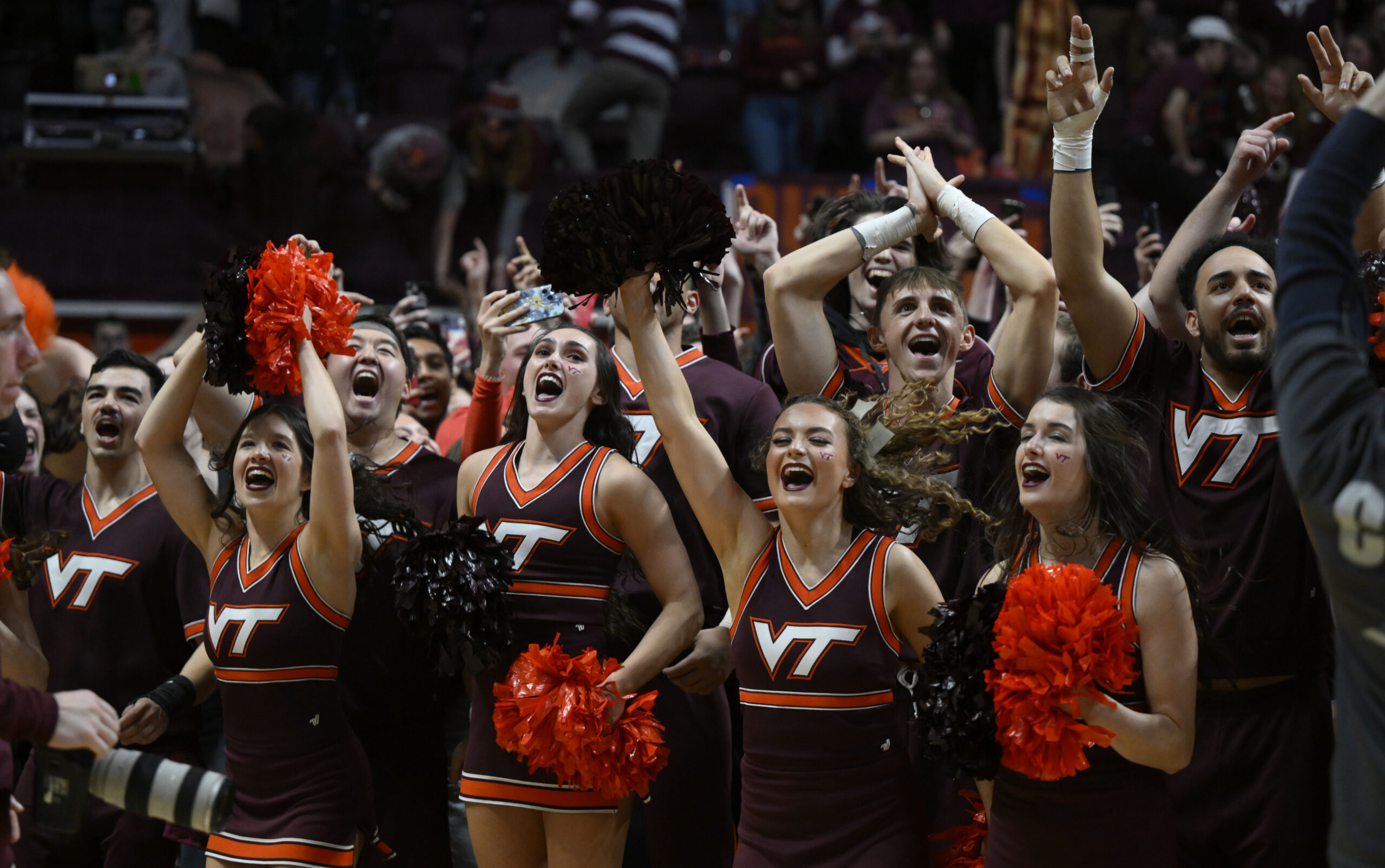Feb 4, 2023; Blacksburg, Virginia, USA;  The Virginia Tech Hokies cheerleaders gather on the court after the win against the Virginia Cavaliers at Cassell Coliseum. Mandatory Credit: Lee Luther Jr.-Imagn Images