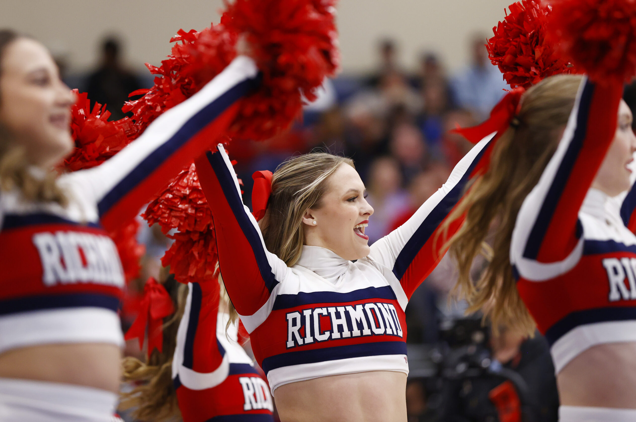 Mar 9, 2024; Henrico, VA, USA; Richmond Spiders cheerleaders perform on the court during a stoppage in play during the first half of the game against the Duquesne Dukes at Henrico Sports & Events Center. Mandatory Credit: Amber Searls-Imagn Images