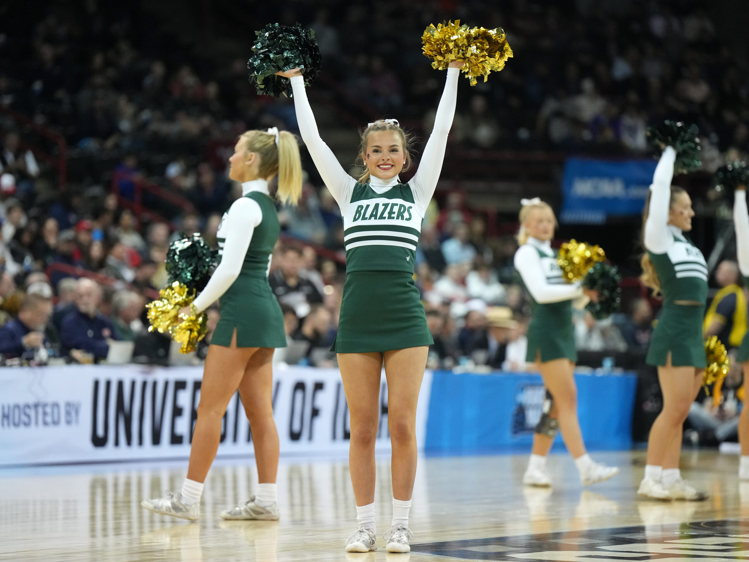 Mar 22, 2024; Spokane, WA, USA; UAB Blazers cheerleaders perform during the first half of a game against the San Diego State Aztecs in the first round of the 2024 NCAA Tournament at Spokane Veterans Memorial Arena. Mandatory Credit: Kirby Lee-Imagn Images
