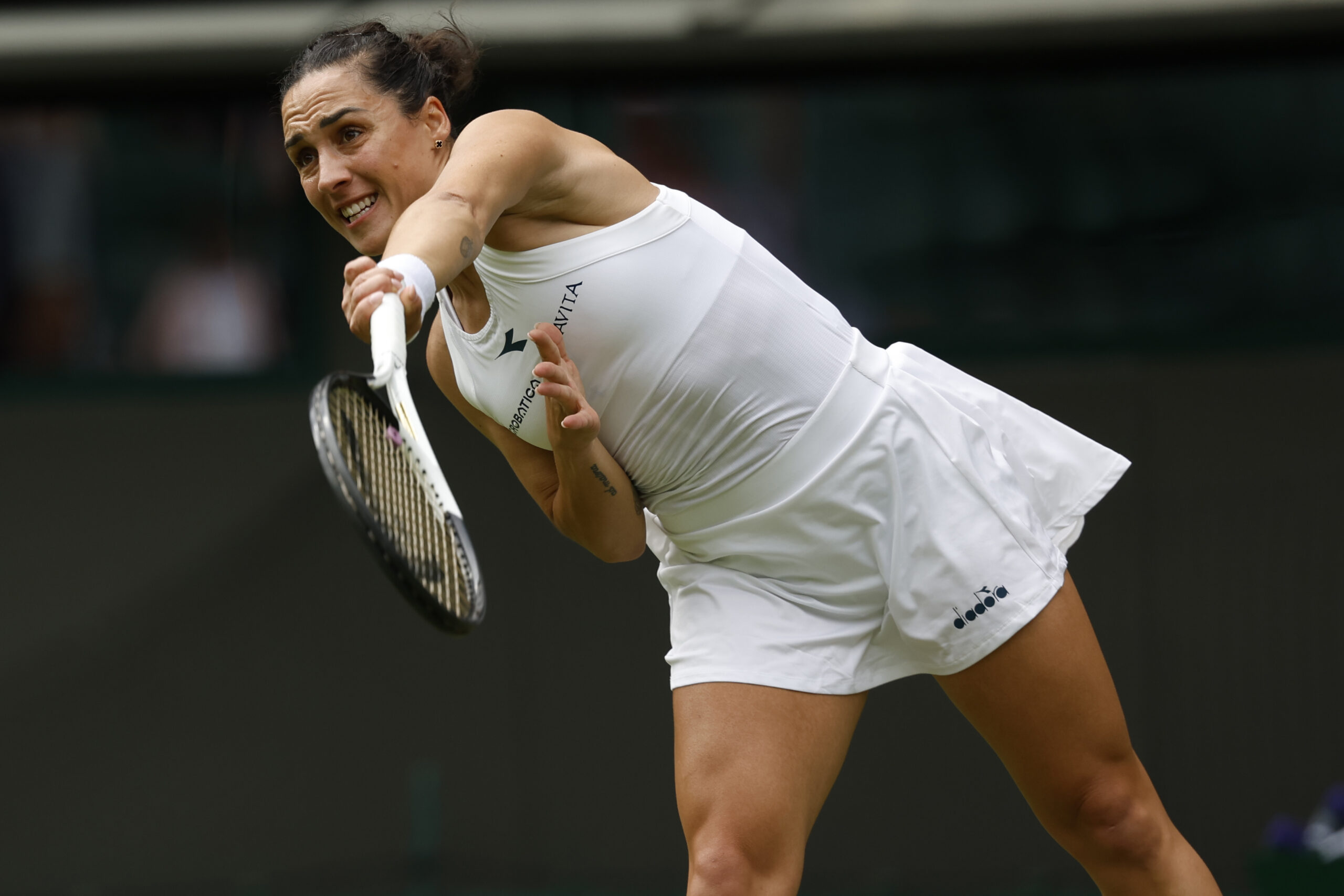 Jul 1, 2024; London, United Kingdom, Martina Trevisan (ITA) serves against Madison Keys (USA (not pictured) in a ladies singles match on day 1 in The Championships Wimbledon at the All England Lawn Tennis and Croquet Club. Mandatory Credit: Geoff Burke-Imagn Images