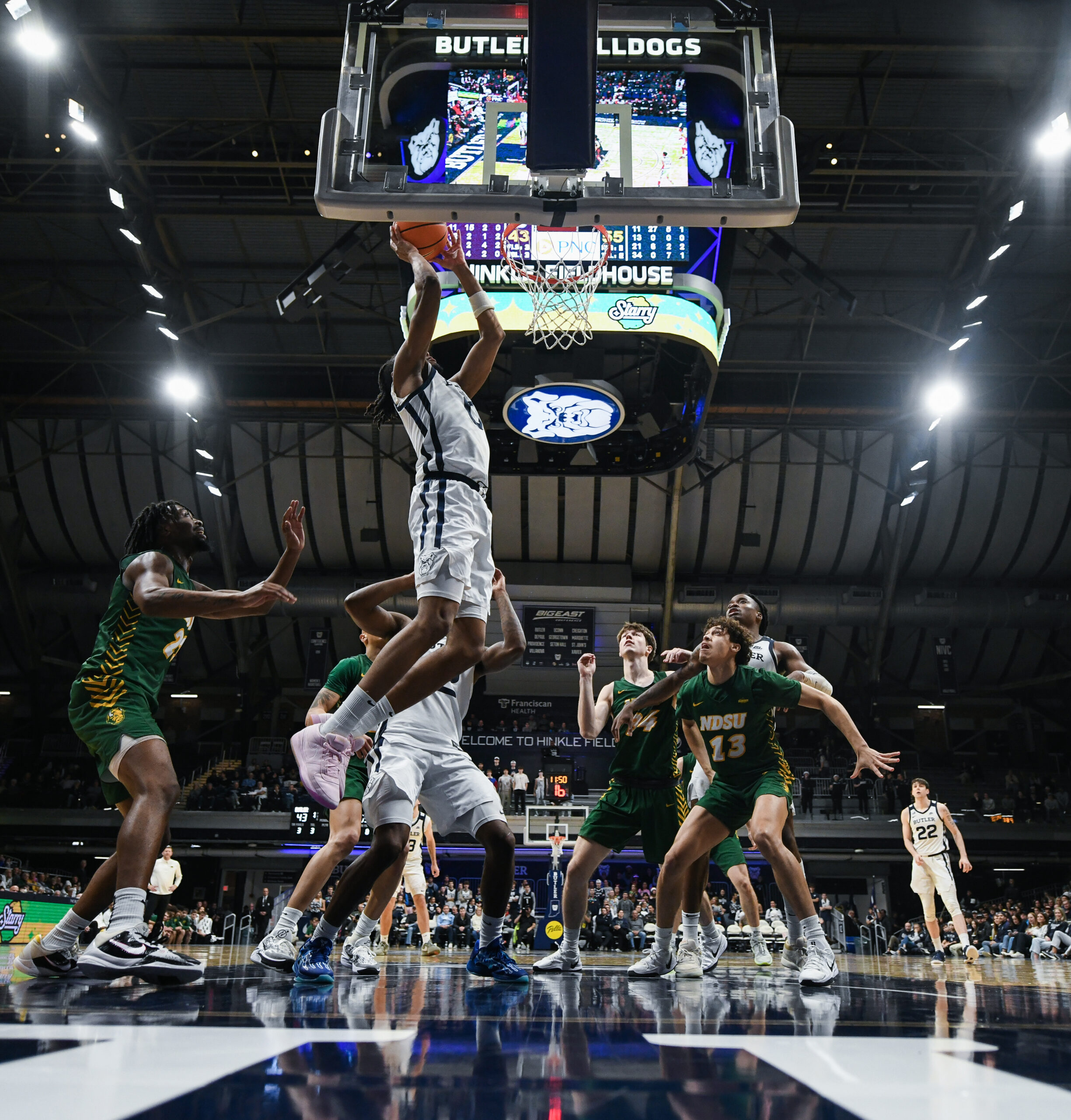 Dec 10, 2024; Indianapolis, Indiana, USA; Butler Bulldogs forward Augusto Cassia (0) scores during the second half against the North Dakota State Bison at Hinkle Fieldhouse. Mandatory Credit: Robert Goddin-Imagn Images