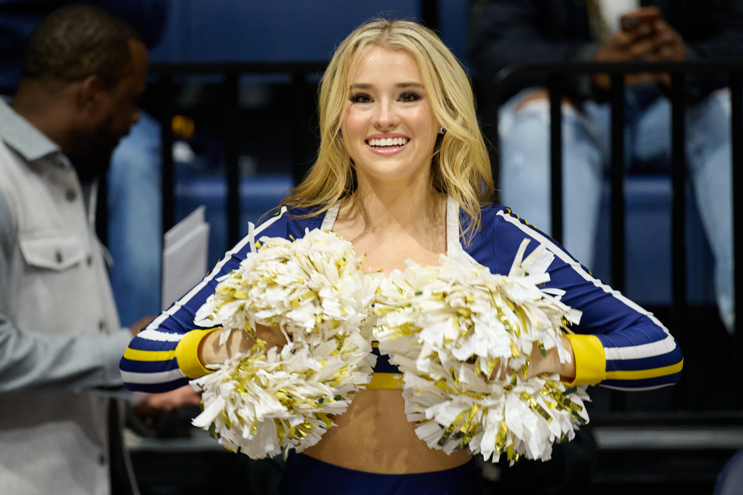 Dec 14, 2024; Berkeley, California, USA; A California Golden Bears cheerleader performs during a stoppage of play against the Northwestern State Demons in the second half at Haas Pavilion. Mandatory Credit: Robert Edwards-Imagn Images